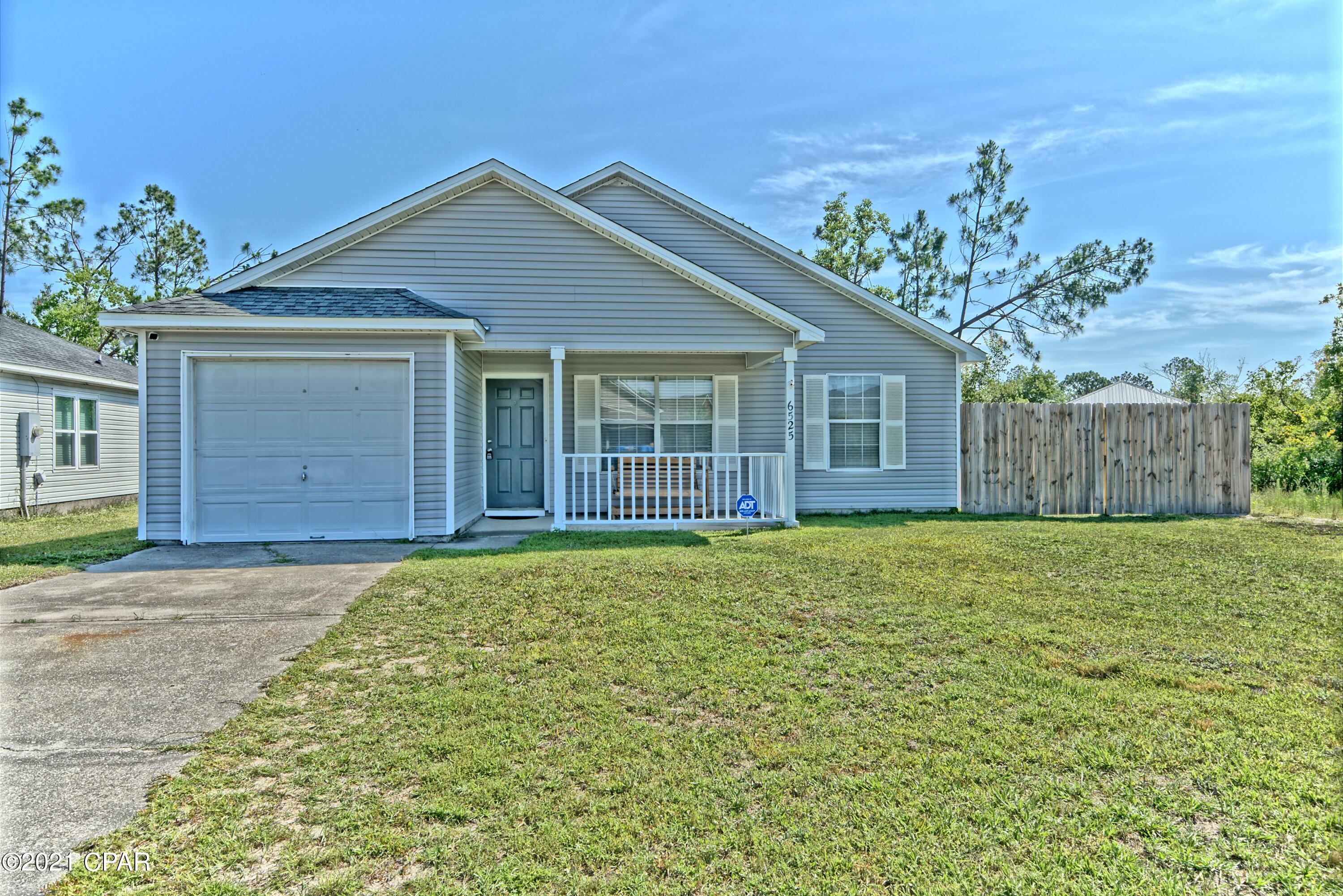 CURRENTLY UNDER CONTRACT, SELLER ACCEPTING BACKUP OFFERS (has one accepted back up)Welcome to Peaceful neighborhood of Sweetwater Village! This remodeled after hurricane home offers 3 bedrooms and 2 bathrooms, single car garage and a spacious fenced all around back yard.  It's perfect for your family and friends!  The kitchen features  stainless flat top stove and dishwasher overlooking dining area that leads into back yard through the sliding patio door. Vinyl floor plank and tile can be found throughout the home. Both bathrooms feature beautiful tiled shower/tub combos in modern grey colors. Covered front porch is another benefit of this cozy home. All counter tops are made out of granite. Sweetwater Village has a tranquil lake and a convenient short drive to town and shopping in Lynn Haven, 25 minutes to Tyndall AFB makes this property exceptional! Don't miss an opportunity to take a look at it. All sizes approximate and taken from public records, Buyer to verify any and all details Buyer deems important.
 
- Washer dryer included.
- Front Window to be  changed before closing. 
- AC 2019 
- Water Heater newer 40 gal, says year 2007 on the tank (to verify by buyer) 
- Flood zone
- Roof 2019