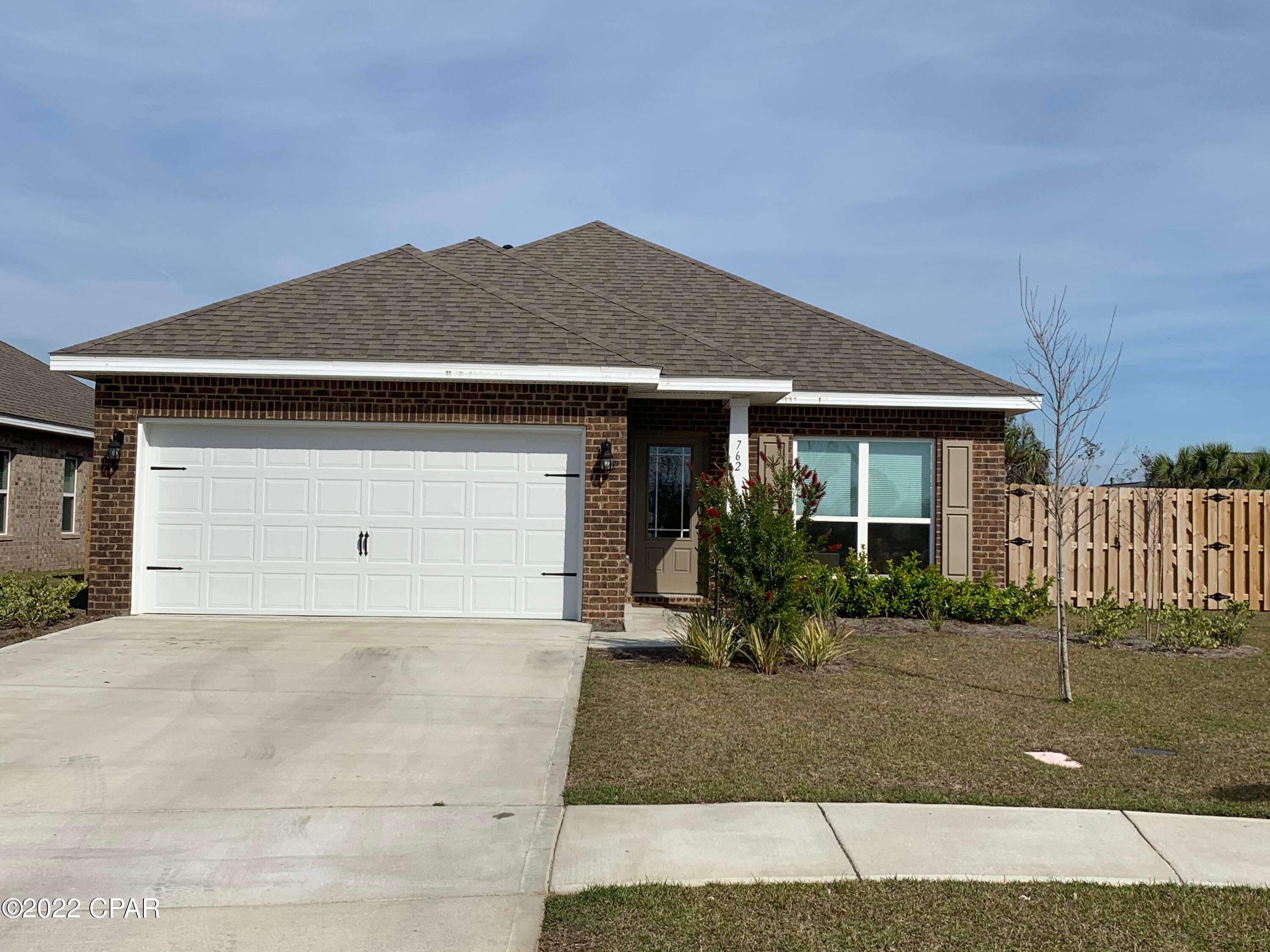 AVAILABLE MAY 2022!!! Beautiful newer construction home located in the quiet neighborhood, Andrew's Plantation, Lynn Haven, FL. This home is located in one of four cul de sacs on Cason Circle which provides a very large backyard that is privacy fenced. The home features 9' ceilings throughout, luxury vinyl plank flooring, granite countertops in the kitchen and bathrooms, LED lighting and stainless steel appliances. The master bedroom features a trey ceiling and the master bath a double vanity, garden tub, separate shower and a large walk-in closet. The living room has a cathedral ceiling with lots of natural light from the windows and glass door. The back patio is covered.