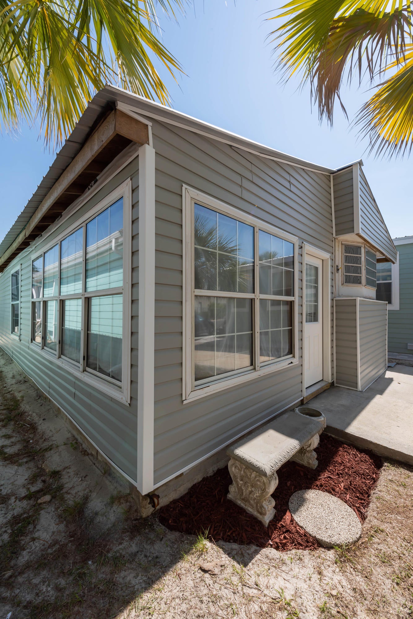 *UNDER CONTRACT - TAKING BACKUPS* Don't miss your chance to own a 2 bedroom/2 bath Venture Out getaway where you have the opportunity to put your own stamp of design on it.  Home is down to the studs in the majority of the sq footage, but this allows you to finish it exactly as you wish.  Close to the back common area complete with the fishing dock, heated pool (in winter), basketball/playground areas and bbq grills/picnic areas.  Venture Out offers beachside pool as well and private beach access for Venture Out.  Mini golf, tennis, shuffle board are also part of the features.  Snorkel in the amazing waters of St. Andrews State Park, which entrance is within walking distance.  Venture Out's location on the quiet extreme east end make it desirable for families seeking vacations.
