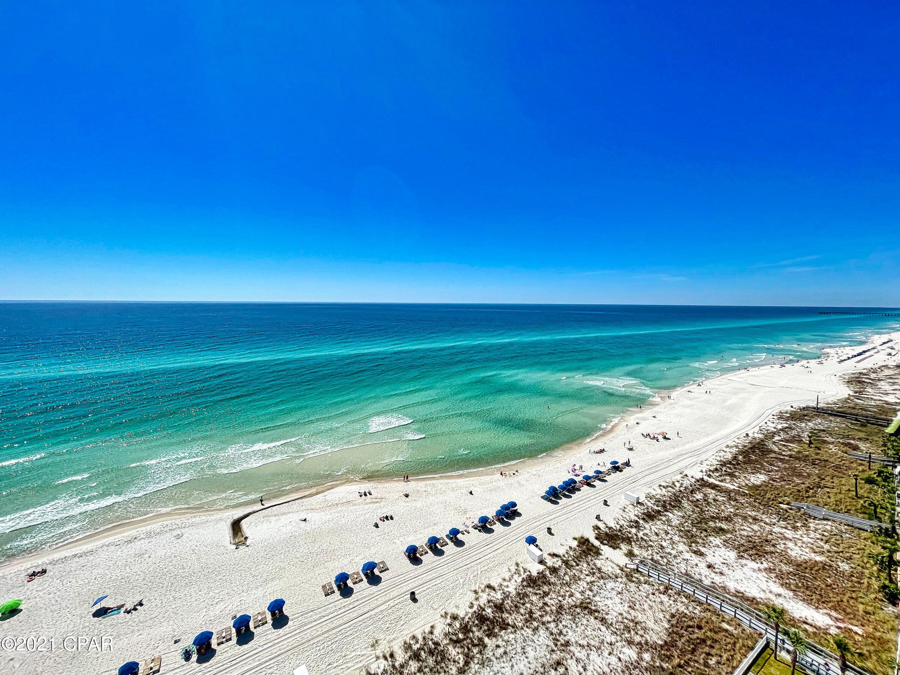 This beautiful, beach-front, fully-furnished, Ocean Reef condo is waiting on you! Features include: tiled floors, stainless appliances, matching kitchen backsplash and breakfast bar facing, wood tiled bedrooms, gulf-front master bedroom, dual bathroom vanity, stacked front loading washer/dryer, and large 10x28 balcony!  Located on the west end of Panama City Beach, Ocean Reef is in a fabulous location with restaurants, gift shops, miniature golf, go-carts, donut/coffee shop all within close proximity. The Pier Park shopping and restaurant district is just 1.5 miles down the road. From your balcony you can view the beach, gulf, and both the city and county piers while enjoying both fireworks shows during certain times of the year. An assigned parking space close to the elevators is included The A/C Unit date of manufacture is 1/27/20.