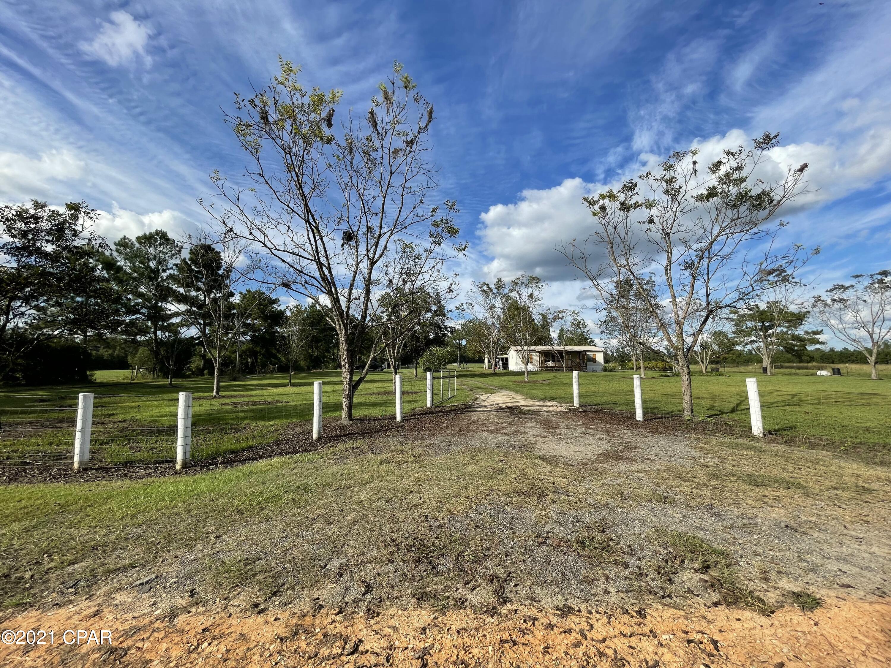 CURRENTLY UNDER CONTRACT, SELLER ACCEPTING BACKUP OFFERS'This completely remodeled 3/2 on 4.55 acres of high and dry high quality pasture is set up perfectly for horses or other livestock. Home has a metal roof(2016), all new floor covering, and gorgeous custom wood work throughout!!! 

Property is fenced and cross fenced with a LARGE four stall barn! Make your appointment to take a look at it today!