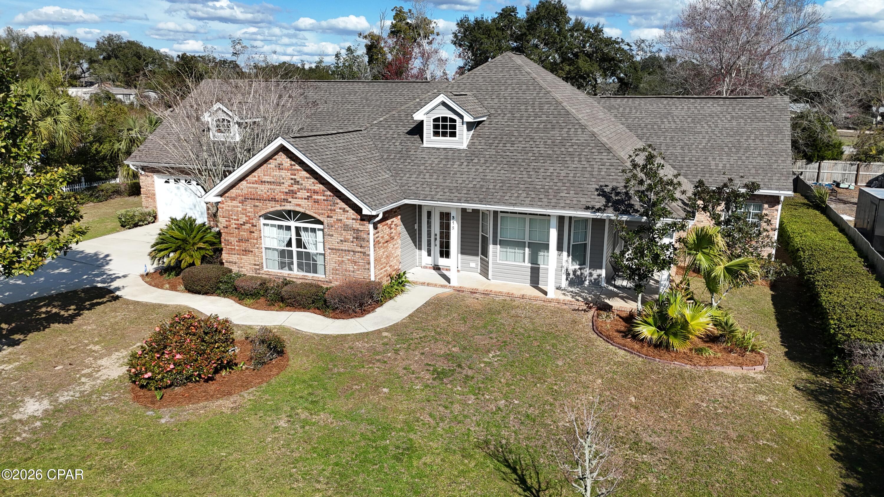 Spacious 3-bedroom, 2-bath traditional ranch-style brick home offering approximately 3,006 sq. ft. of living space in the heart of Callaway. This well-designed home features a split floor plan with generous living areas and thoughtful details throughout. An additional room just off the garage provides flexibility and could easily serve as a 4th bedroom, home office, or bonus space to fit your needs.

As you enter through the grand front entrance, you are welcomed by a formal dining room, perfect for hosting gatherings and special occasions. The kitchen is truly built for entertaining, offering ample counter space and a layout that flows seamlessly into the living areas. Just off the kitchen, you will find a breakfast area complete with built-in china and wine storage, giving you both convenience and charm. This home offers the best of both worlds with a full breakfast area as well as a separate formal dining space.

The primary suite is truly impressive, featuring a large master bedroom, a huge master bath, and a spacious walk-in closet located just off the bathroom. The split floor plan provides privacy for the additional bedrooms and guest areas.

Additional features include a good-sized laundry room and an oversized garage with two main bays plus a third rear-access bay perfect for a golf cart or additional storage.

This classic Southern ranch-style brick home welcomes you with a wrap-around front porch, perfect for relaxing and enjoying the neighborhood. Step out back to the back porch, a great spot for winding down and enjoying quiet Florida evenings.

The location is exceptional--just one street over from waterfront property and close to family-friendly parks, including Gore Park right around the corner. Located in the heart of Callaway and just minutes from Tyndall Air Force Base, the area has grown tremendously and now offers a variety of shops, restaurants, and everyday conveniences just around the corner.

This home offers space, charm, and an incredible location all in one.