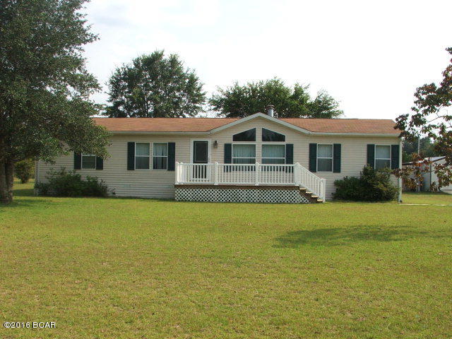 **PRICE REDUCED** For this extremely nice home on 2.06 acres. Move in ready, like new manufactured home featuring fireplace, appliances, garden tub in master bath, outside storage building, screened porch on back. You must see to appreciate!