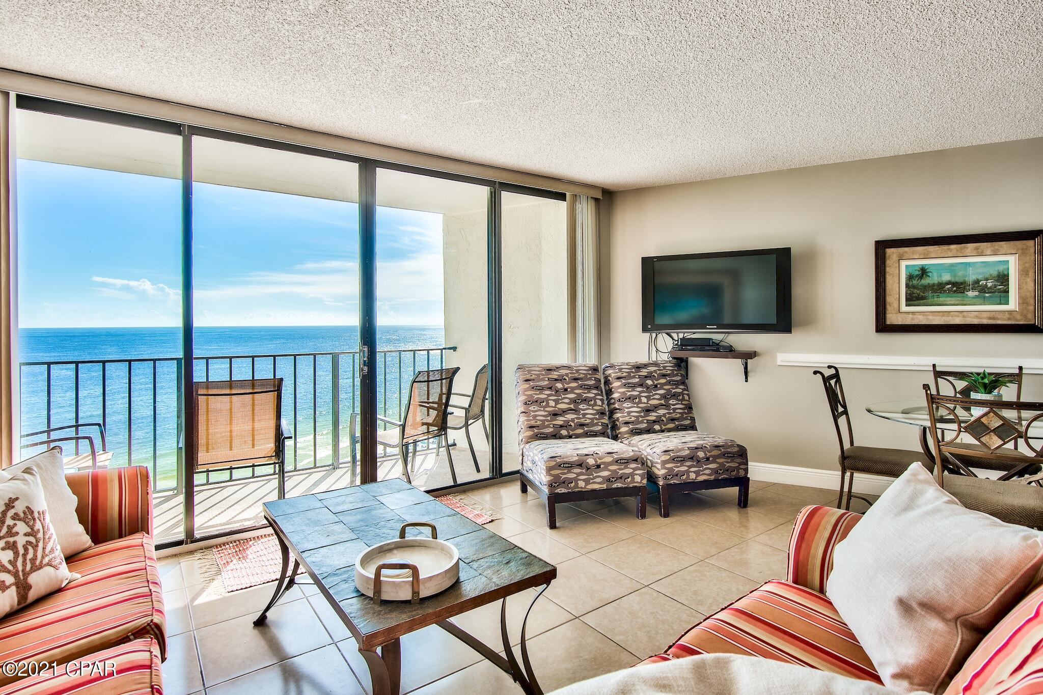 Fantastic 2-story PENTHOUSE unit offering 2 bedrooms with an upstairs loft that could easily serve as a third bedroom. The second level also offers a kitchenette, full bathroom, and a rooftop balcony! This unit offers two balconies to enjoy stunning Gulf views from the 12th floor elevation. The open floor plan and floor to ceiling windows & doors allow Gulf views from all of the common areas. Tile floors extend throughout the entire unit making it easy to maintain. The kitchen features stainless steel appliances, ample granite countertops, pantry, and a large breakfast bar. This unit is being sold fully furnished & decorated making it a great turnkey investment with rental history of $59K! The main level also encompasses the master bedroom, a guest bedroom, and two full bathrooms. The master bedroom is spacious and offers a king bed and en-suite bathroom. The guest bedroom offers a queen bed and has direct access to the guest bathroom which was beautifully updated with a granite vanity and walk-in tile shower accented with lovely mosaic tile. This unit also features full-size, stackable, front load washer & dryer. The upper level is accessed via a spiral staircase and features a loft (or third bedroom), kitchenette, full bathroom, and rooftop balcony. Guests will surely enjoy the convenience of the upstairs bathroom and the luxury of having a rooftop balcony. The rooftop balcony is definitely a penthouse perk and is great for outdoor dining & entertaining and offers breathtaking views of the emerald Gulf & sugar-white sand beach below. 

Edgewater Beach & Golf Resort is the only full-service resort in Panama City Beach, offering excellent amenities and activities. Edgewater is a gated community and features 11 pools with one being a large lagoon pool, 4 hot tubs, poolside bar, splash pad, beachside restaurant, and a market. The Club offers tennis, golf, basketball, pickleball, shuffleboard, and a fitness center. Edgewater offers everything you could possibly need but is also located just under 5 miles from Pier Park which offers fine dining, shopping, and fun entertainment options for the whole family. Take advantage of this amazing opportunity to own a penthouse unit at one of the finest resorts in Panama City Beach! Brand new AC (over $6k value) is a great perk!