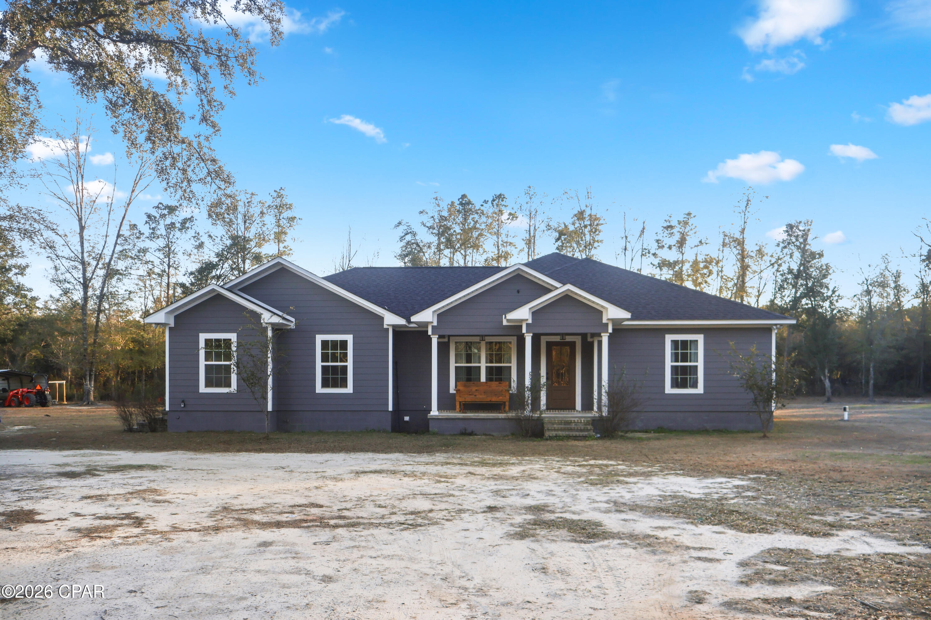 CURRENTLY UNDER CONTRACT, SELLER WILL CONSIDER BACKUP OFFERS

Tucked away on 7.9 mostly cleared acres, this 4-bedroom, 2-bath home at 16989 NW EG Buck Larkins Road offers the space and freedom many buyers are looking for, inside and out. With 1,923 square feet, the layout is designed for everyday comfort and easy gatherings.

The kitchen opens to the main living space, making it simple to stay connected while cooking or hosting. 

The primary suite is a true retreat, featuring a tray ceiling, dual vanities, a walk-in shower, and a soaking tub, perfect for slowing down at the end of the day. 

Step outside to enjoy both a covered front porch and covered back porch, ideal for morning coffee or enjoying the evening overlooking your land.

A metal carport adds flexibility for storage, hobbies, or equipment, and the open acreage gives room to roam, garden, or enjoy the outdoors your way.

Location adds even more value, just one hour from Mexico Beach and Tallahassee, 15 minutes from the Apalachicola National Forest, and minutes from the Bristol Boat Landing. Fishing, hiking, and beach trips are always within reach.

If you're ready for space, comfort, and a lifestyle connected to nature, schedule your private showing today and experience this Bristol property in person.