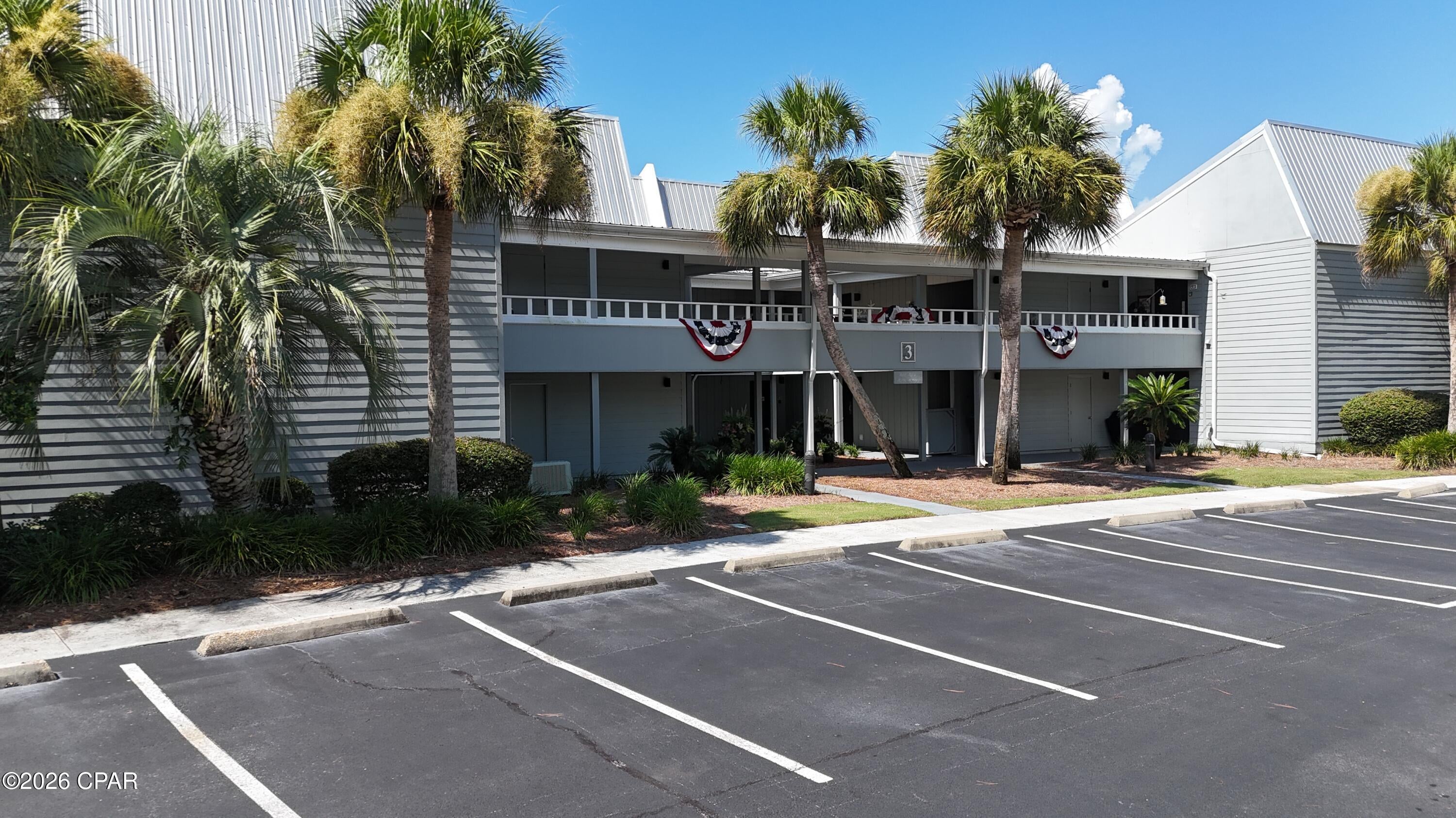 Bay Point Bayview Villa with view of Grand Lagoon.  This remodeled unit has extensive renovations with an abundant amount of nickel gap shiplap and floor to ceiling windows.  The kitchen and bathrooms make excellent use of the space.  Bayview has a community boat dock and trailer parking for up to a week.  Located inside of Bay Point with manned gates and roving security patrols.  Point South Marina rents private deep water wet slips.  Nicklaus golf course, Bar 72, and Hilton resort all within a golf cart friendly neighborhood.