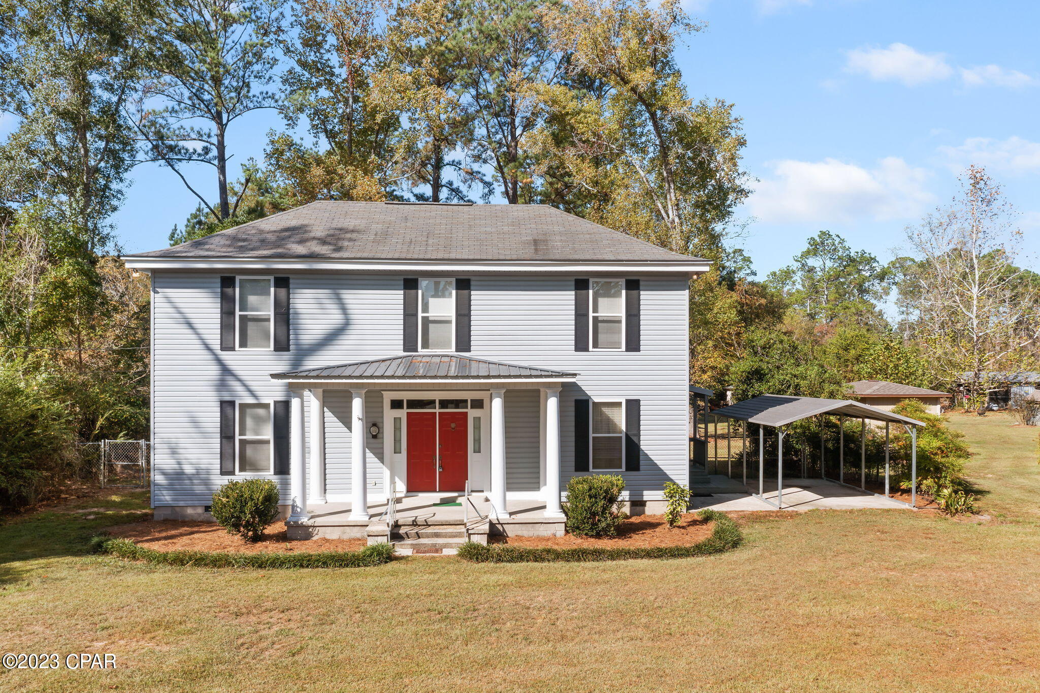 CURRENTLY UNDER CONTRACT, SELLER WILL CONSIDER BACKUP OFFERS. Nice country setting with this 3/2 two story historic home on .79 +/- lot. You'll feel at home as you walk around the spacious floorplan of this 1920's two story home. Kitchen has wood cabinets, plenty of counter space, breakfast bar. Formal dining room. Large living room has access to the screened in back porch, full bath with laundry. Bonus closet used to be a half bath and could be converted back. Den for extra room and could be used as an office or additional space if needed. Upstairs you'll find 3 spacious bedrooms with hardwood floors, one has a fireplace. Full bath. Both fireplaces could be converted to gas or electric. Covered front porch. Screened in back porch. Nicely landscaped yard. Outbuilding for additional storage. The was moved to its permanent homeplace in 1980. Close to town for local amenities. Must see!