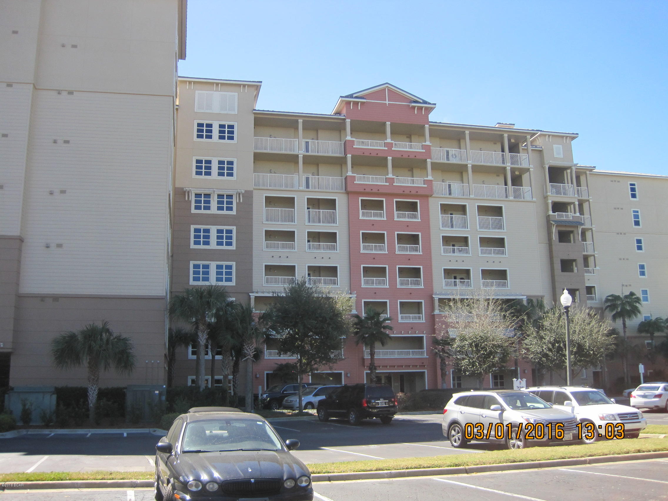 Much sought after end unit. Bright and area great room,26.9 feet by 22.5 feet, has kitchen with raised breakfast bar,  dining area with 5 windows, living area with 2 windows and patio door to covered wrap around porch.   3 bedrooms each with a private bath. This unit has 12 windows and a 8 foot high patio door.

Wrap around covered balcony. Huge shower in master bath along with a soaking tub. Tub shower in bath for 2nd bedroom, Large shower  for 3rd bedroom .

Walk in closet in master bedroom, generous double door closets for the 2nd & 3rd bedrooms. A 10 foot by 6 foot climate controlled storage room is located on the same floor but outside of the living area.