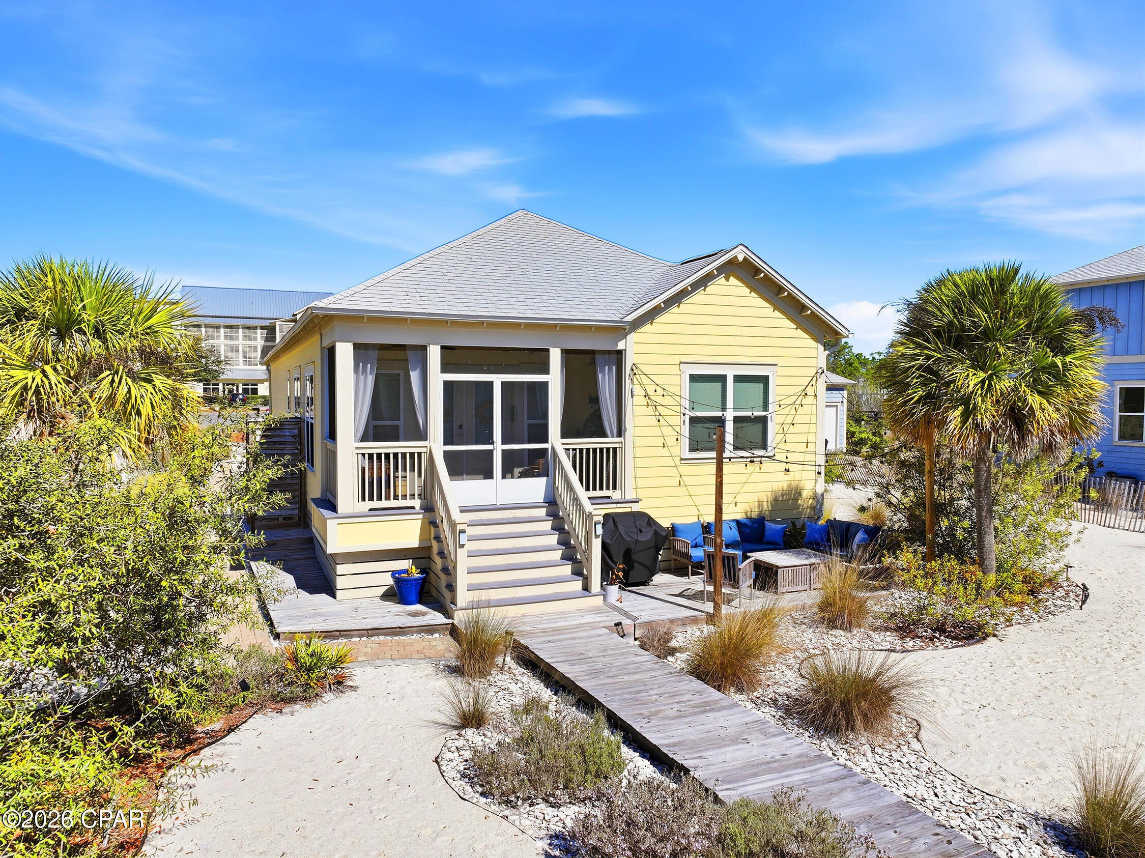 Coastal living at its best in beautiful WindMark Beach! This charming 3-bedroom, 2-bath home offers the perfect blend of comfort, style, and investment potential. Currently a successful short-term rental, the home is an ideal opportunity for those looking to enjoy the beach lifestyle while generating income. Inside, you'll find luxury vinyl plank flooring throughout, providing durability and a clean coastal feel. The spacious kitchen features stainless steel appliances, granite countertops, and an open design that flows seamlessly into the living and dining areas--perfect for entertaining family and guests. Step outside to the screened porch, where you can relax and enjoy the peaceful natural landscaping and coastal breezes that make WindMark Beach so special. The garage offers flexibility for owners and guests alike. While it can easily function as a traditional garage, it is currently set up as a super cool game room--creating a fun and inviting space for gathering and entertainment. The spacious owner's suite provides a comfortable retreat with a large bedroom, walk-in closet, and private ensuite bath. The guest rooms are airy and comfortable with one decked out with double bunk beds! Located in the sought-after WindMark Beach community, this home is just moments from the bay, walking paths, community amenities, and the charming downtown area with shops and dining. Whether you're looking for a personal coastal getaway, an investment property, or both, this WindMark Beach home is a fantastic opportunity to enjoy life along the Forgotten Coast.