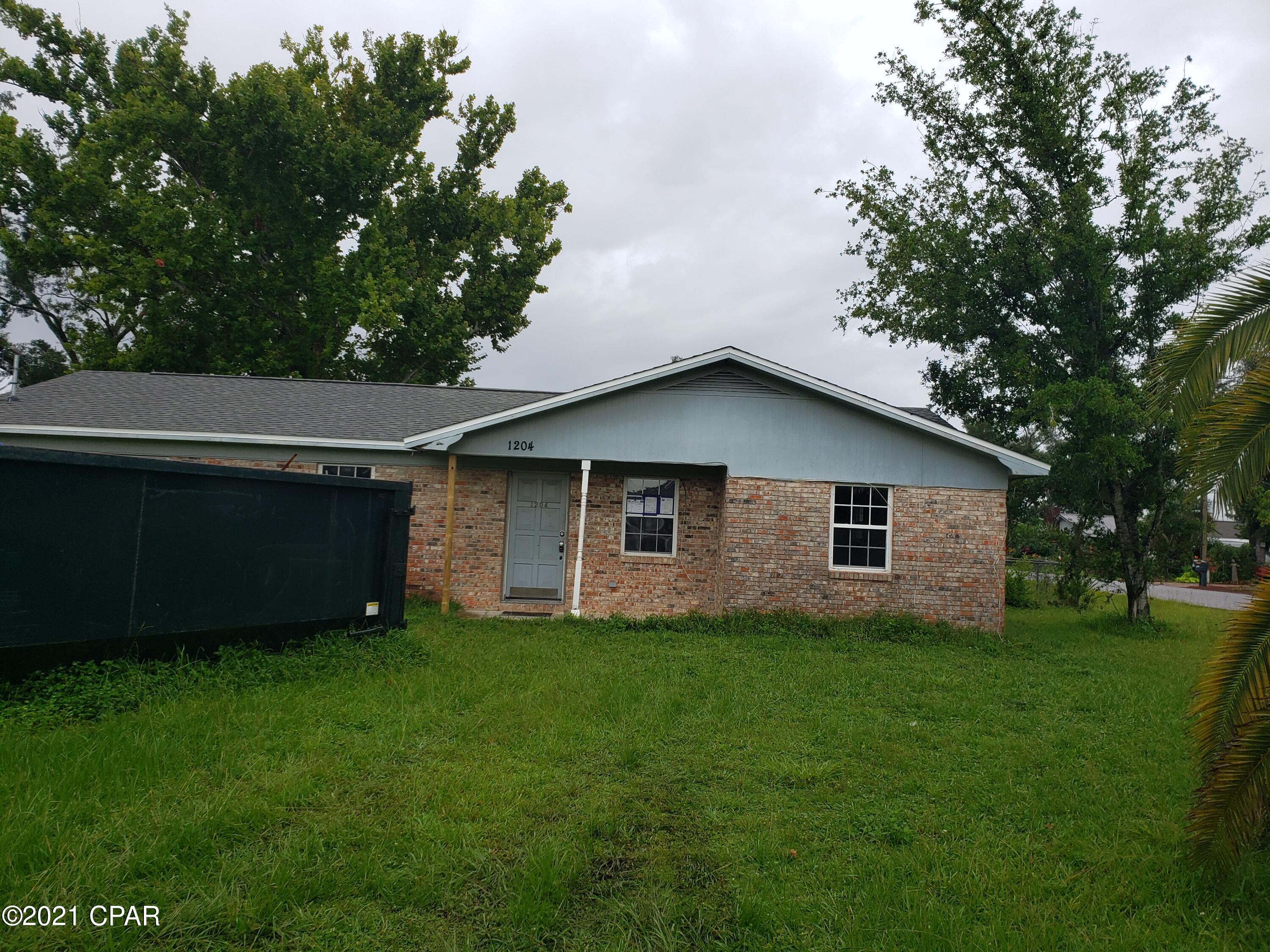 'CURRENTLY UNDER CONTRACT, SELLER ACCEPTING BACKUP OFFERS'  This is a Lynn Haven home ready to be remodeled.  It is gutted to the studs but has a new roof.  It has good double pane aluminum windows, screened patio, and carport.  The home has a continuous gas hot water system.  Sellers are preparing to remodel the home but will sell it now.