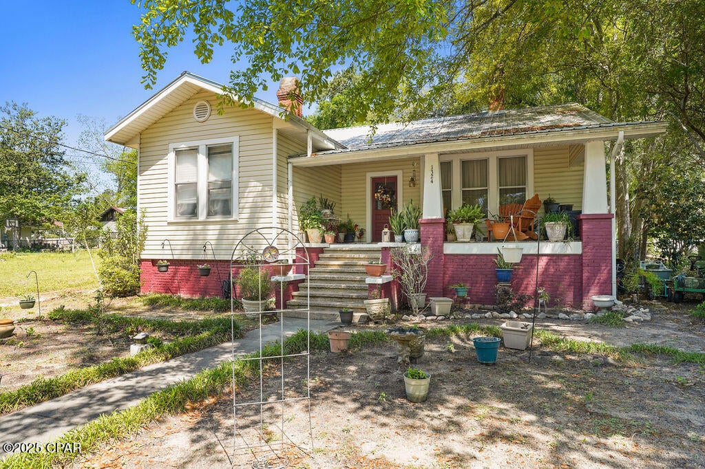Looking for a slice of history? Look no further! Construction on this timeless home began in 1899 and was completed in 1902, offering a rare opportunity to own a piece of the past. Bursting with historical charm, the home features classic details like a clawfoot tub, a wood-burning stove in the downstairs sitting area, and a fireplace with gas logs in the living room. The main level includes a cozy library, two bedrooms, a formal dining room, and a spacious eat-in kitchen perfect for gathering. Upstairs, you'll find two additional bedrooms, a full bathroom, and a large, accessible attic that provides ample storage space. Recent updates include a downstairs A/C unit that's just 3 years old, a 3-year-old water heater, and a 15-year-old roof. Don't miss your chance to own this beautifully preserved historic gem!