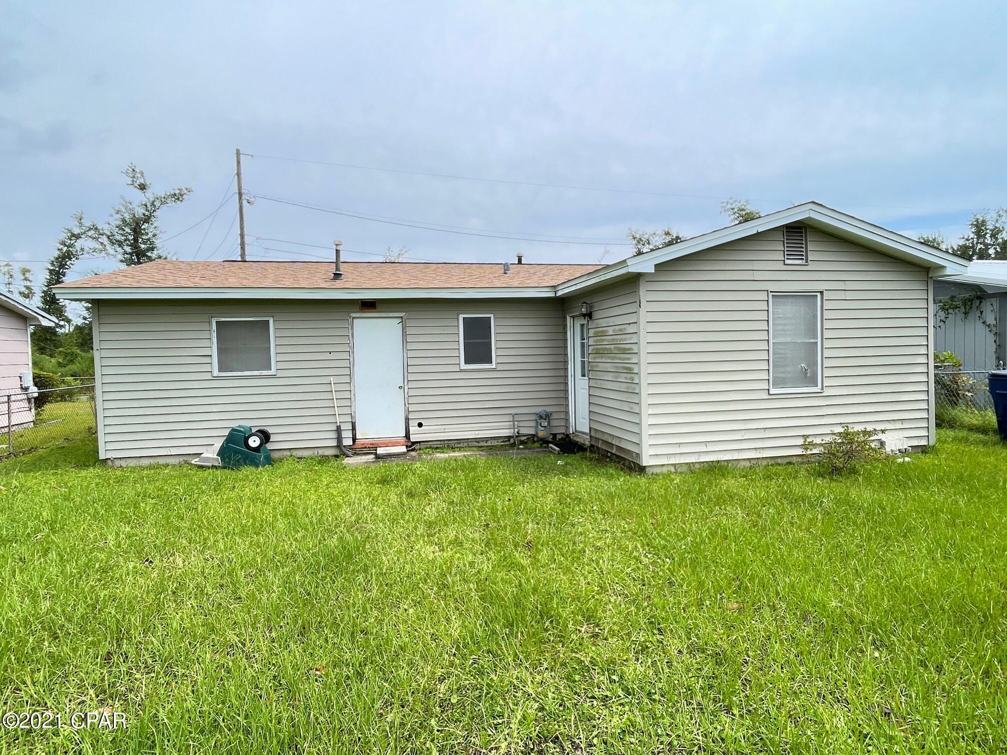 A 3 bedroom house , in town AND under $100k !!  CONGRATZ !! You found it !! Plus, this includes a new roof and a new water heater. It would make a great starter home OR an ideal investment property.  You decide how a rare find like this is best used. It can use some touch ups and minor repairs. Hurricane damage has been mostly repaired. Check it out and see what you think.