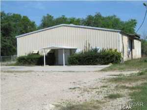 This 4.28+/- acre site includes a 5,000 SF warehouse, with a dock high and a ground level loading docks. The building includes two 12 Ft. by 12 Ft. roll-up doors, 14 Ft. eves, a 400 SF office with restroom, a 40 Ft. by 40 Ft. (1,600 SF) CrownTonka walk-in refrigeration cooler, and 3 phase 400 AMP power service. Site offers excess land for future expansion of the existing facility, and the north property line borders the railroad tracks. Site was formally a distribution center for Kraft and Nestle.