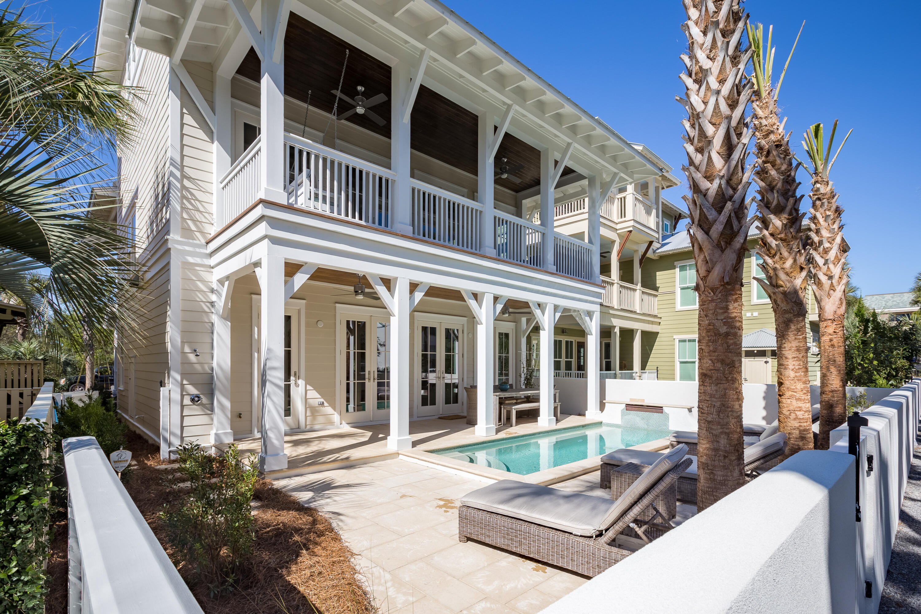 'Coconut Cloud' is remarkable home in the highly sought after community of Water's Edge. This gated community South of 30A is located just steps from Rosemary Beach, ALYS Beach, and Seacrest Beach. The neighborhood also has private deeded beach access that is only shared among the 34 homes in the community. This home, with its own private pool, is a perfect retreat for a second home or a rental property. Every room, other than one bunk room has its own ensuite bathroom. Durable and beautiful, Peacock Pavers run throughout the first and second floors. Upon entering the home you see the open concept that flows perfectly between the living, dining, kitchen, and outdoor area. The master bedroom is also conveniently located on the first floor. The second floor has a separate living space for entertaining or watching tv. It also opens up to the spacious balcony overlooking the pool. Three bedrooms, three bathrooms, and the laundry room make the second floor feel both private and accessible. The Third level has two bunk rooms and another full bathroom. "Coconut Cloud" is a remarkable home with an exceptional floor plan that is a must-see.

Buyer to verify all information and dimensions. Information is deemed reliable but not guaranteed.