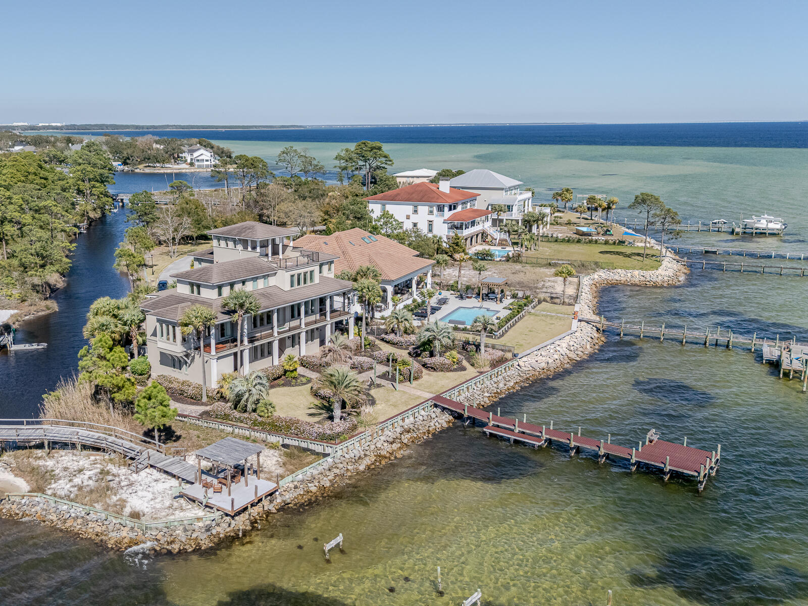 Stunning Waterfront Luxury Home with Panoramic Bay Views!
Imagine waking up every day to breathtaking panoramic views of Choctawhatchee Bay. The best part? You can enjoy these stunning vistas from every angle on the top floor of this exceptional home. Whether you're sipping your morning coffee or unwinding at sunset, the views are nothing short of spectacular—stretching from Shalimar and Fort Walton Beach to Destin and the Mid-Bay Bridge.
With over 100 feet of deeded waterfront access and two private docks, this property is nestled within a gated island community, offering both privacy and exclusivity. You'll be just minutes from beaches, airports, military bases, and shopping—yet tucked away from the crowds of tourists.