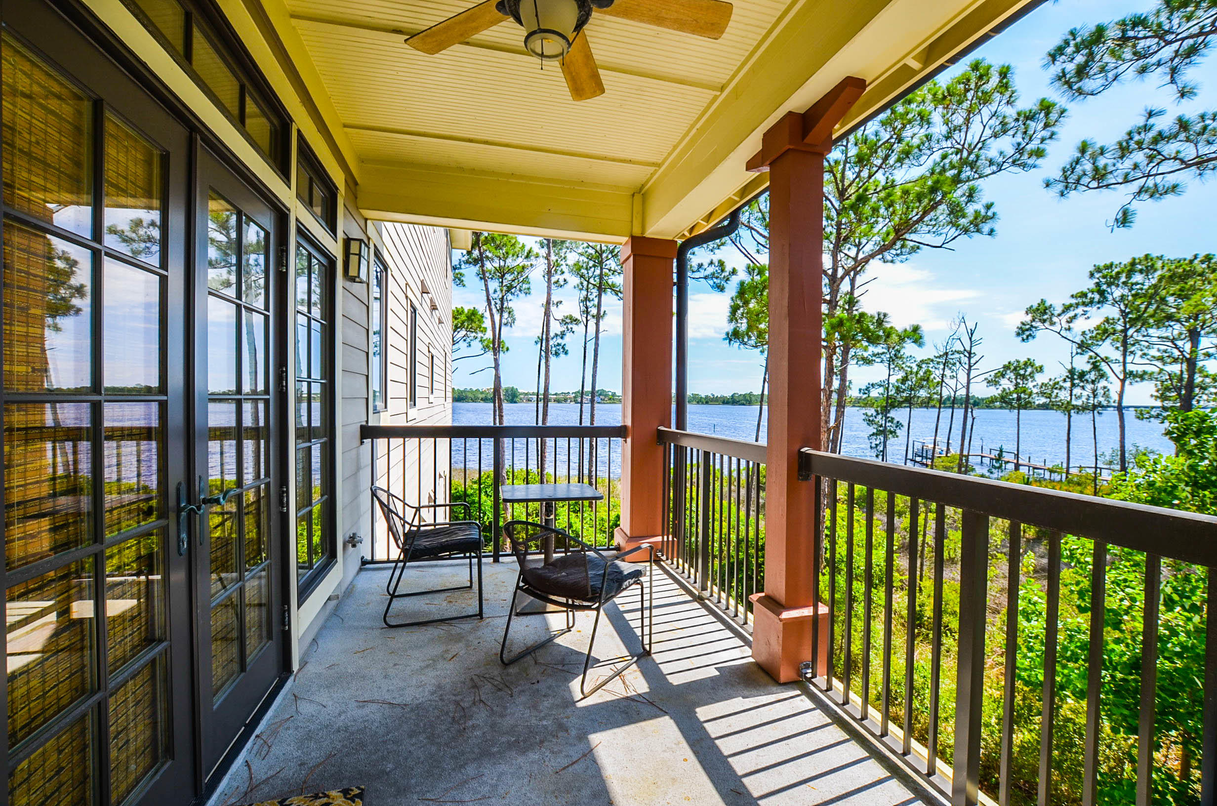 REDUCED PRICE - SELLER SAYS MAKE ME AN OFFER. Beautiful Coastal Craftsman style condo overlooking Lake Powell in the Greg Norman Sharkstooth Golf Course community of Wild Heron, east of Scenic Highway 30A/Inlet Beach/Rosemary Beach and west of Pier Park. Wild Heron is a 750 acre coastal sanctuary on Lake Powell, one of the coastal dune lakes this area is noted for. This condo has open concept living room, dining room & kitchen combination. It has granite countertops, stainless appliances & balcony overlooking the lake. View of the Gulf of Mexico in the distance. Parking under building for one car, elevator, community pool, health club, boat dock and walking paths. All furnishings convey.