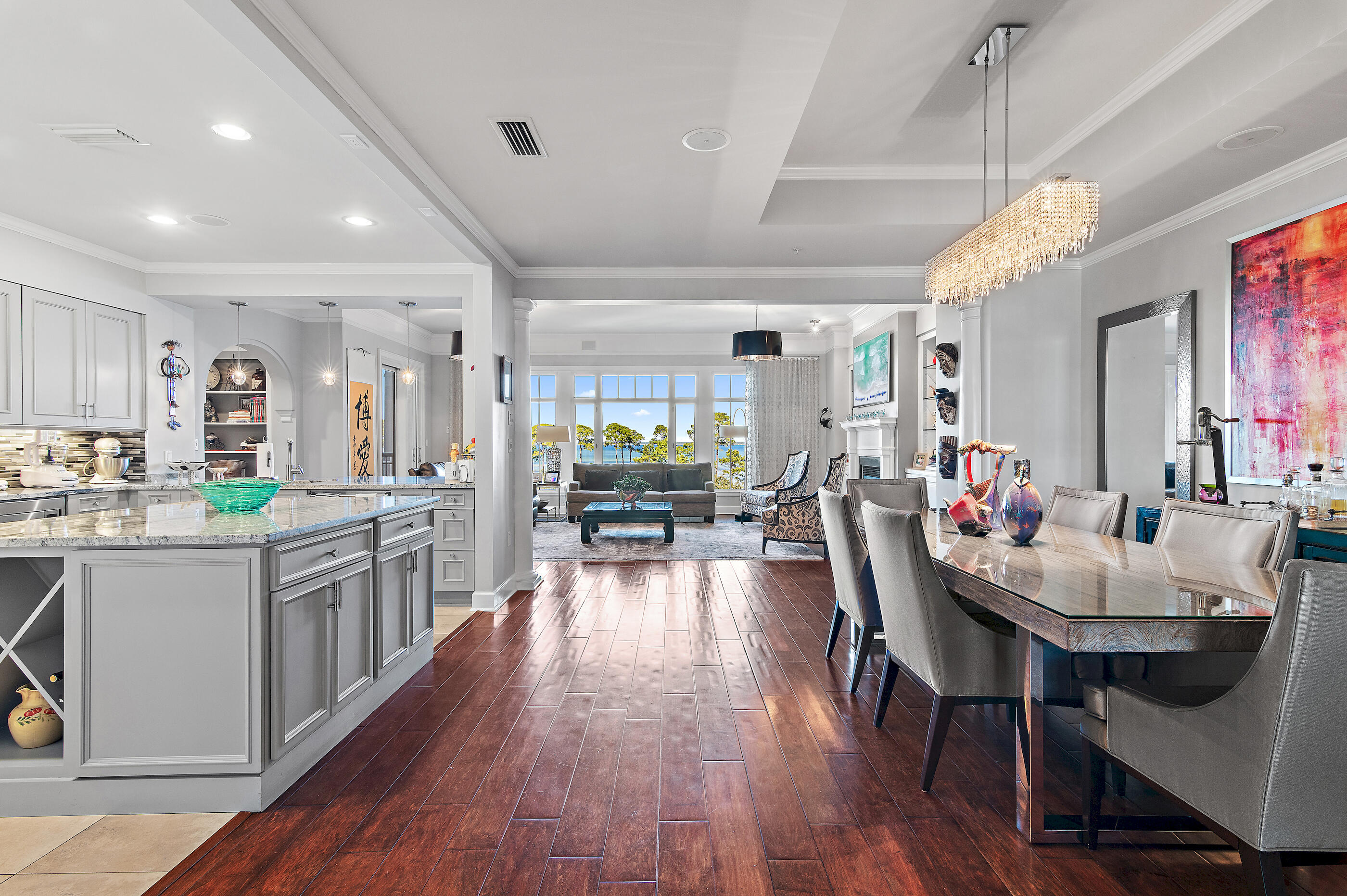 Welcome to One Water Place, unit 401. With over $111,000 in upgrades and renovations, this residence offers exceptional quality and value. Step off the elevator into your private vestibule and be welcomed by custom contemporary double doors with beveled glass, setting the tone for the thoughtful design throughout. This unit also includes a highly sought‑after golf cart space, a rare convenience within the community. Inside, you're immediately drawn to the sweeping views of Choctawhatchee Bay, framed by mature trees and the signature hole of Kelly Plantation Golf Course. As you move toward the main living area, the vista expands over the serene, garden‑inspired setting of the multi‑tiered community pool, creating a peaceful and luxurious backdrop that enhances everyday living. Designer furnishings shown in the home are negotiable.

Private elevator vestibule enhances privacy and exclusivity.

Custom contemporary double doors with beveled glass create a striking entry.

Expansive bay, golf course, and pool views provide a rare and elevated living experience.

Over $111,000 in renovations and upgrades throughout the residence.

Includes a highly soughtafter golf cart space, a valuable amenity within the community.