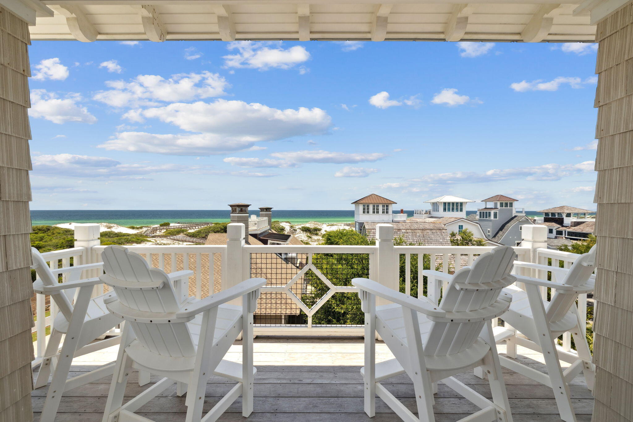 Ideally located in the gated community of WaterSound Beach, 85 S Founders Lane offers a blend of architectural character and thoughtful design, just a short distance from the Dunesider pool and boardwalks leading to the beach. Spanning more than 4,500 square feet across three levels, this six-bedroom, six-and-a-half-bathroom home is designed with comfort and functionality in mind.

The first level features a secondary living area, three guest suites—including a custom bunk room—and access to a screened porch overlooking a peaceful outdoor setting. On the second floor, an open-concept layout connects the kitchen, dining, and living spaces, enhanced by exposed brick accents, wood beams,  and natural light from large windows.
