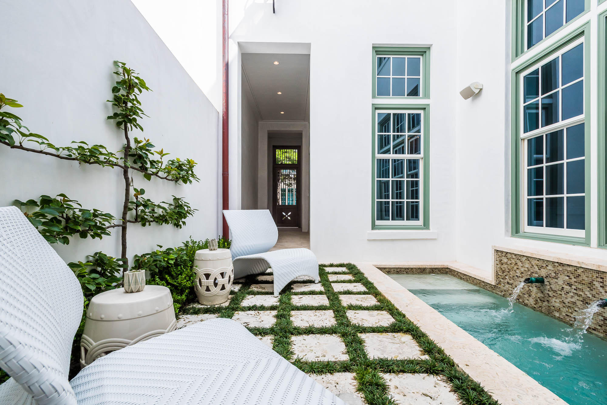This stunning 2,514 square foot home, designed by Architect Gary Justiss, overlooks the solitude of Arboleda Park amongst the emerging Town Center, Caliza Pool & Restaurant, and ZUMA, the Fitness Center scheduled to be completed Spring 2019.
This home showcases 3 bedrooms, 3.5 baths, with a bunkroom, a two-car garage and a private courtyard with a pool. A large master bedroom and a front loggia with a summer kitchen are the perfect places to take in the serenity of the park.