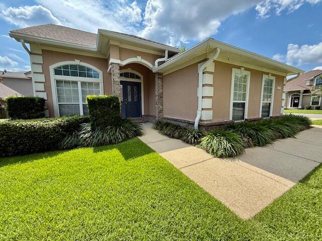 AVAIL: 8/15. SEC DEP = $2400. YARD SERVICE INCLUDED IN THE RENT! SMALL/MEDIUM DOG FRIENDLY W/ OWNERS APPROVAL & W/ A NON-REFUNDABLE PET FEE. GORGEOUS 2 STORY BRICK/STUCCO HOME! CORNER/CUL-DE-SAC LOT! Newer interior paint & carpet! Home features a split bedroom plan for extra privacy. Living room has recessed lighting, gas fireplace & vaulted ceilings. Eat in kitchen features a dining area, breakfast bar, lots of cabinetry w/ lazy Susan's, recessed lighting, pantry, garbage disposal & all stainless steel appliances in place. Master suite downstairs; bathroom has cultured marble, separate shower, whirlpool tub, double vanity sinks & a walk in closet. Inside utility room w/ shelving. 1/2 bathroom downstairs for guests. Upstairs you will find 3 bedrooms (2 w/ walk in closets) & a full bathroom. Ceiling fans in all rooms except for wet areas. Side entry 2 car garage w/ auto garage door opener, shelving & attic storage. Outside you will find a privacy fenced backyard, lawn pump & sprinkler system on timer for easy lawn care & a covered back patio w/ recessed lighting & ceiling fans great for relaxing/entertaining. Close & convenient to both bases, schools, shopping, hospital, restaurants & the beautiful white sandy beach! Sorry, no smoking allowed anywhere on the property inside or out by Tenants or guests. Tenants required to view the property in person before applying & abide by the HOA rules. Only 2 vehicles allowed due to limited parking space.