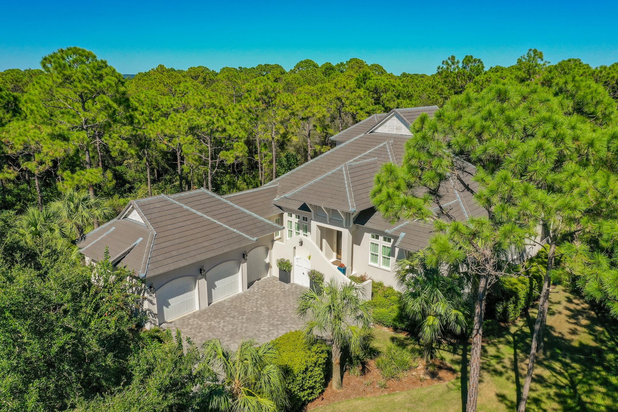 This Beautiful Home still looks and feels Brand New! It has been used as a second home and has been very well maintained! Hickory wood flooring, plantation shutters, Kohler plumbing, plenty of  storage and tons of natural light are features you will see throughout the entire home! The Chef's kitchen features, Quartz countertops, an oversized Quartz Island, 48'' Thermador Gas Range/Oven Combo, Sub-Zero refrigerator, polished nickel fixtures, extra large walk-in pantry, and a wet bar with an icemaker. Other features you'll find on the 1st floor include, master bedroom, guest bedroom with large bathroom and walk in closet and a full office. Additional features include a custom cast concrete mantle and fireplace, a 12ft. coffered foyer entry with reclaimed solid wood detailing, Beautiful custom 8ft. mahogany front doors and a very large laundry room.  The spacious master bedroom features a sitting area, views of the pool, and large walk-in his and her closets. The master bath offers, double vanities, a soaking tub and a separate walk-in tiled shower. On the 2nd floor you'll find a covered balcony overlooking the pool, 2 guest bedrooms with large walk-in closets, 2 full baths, a large bonus room, and a spacious walk-in attic for added storage. The outdoor living area offers views of the beautiful Regatta Bay Golf Course and includes, a large covered patio, a summer kitchen with black granite, and last but not least, a heated saltwater pool with hot tub. A whole house generator was just installed(Summer 2021).

Built by Destin Custom Home Builders! Destin Custom Home Builders utilizes the most current technology for each build using only the finest materials and high end finishes such as: Impact Resistant Windows & Doors, Insulated Garage Doors, Wind and Impact Rated Garage Doors, Foam Spray Insulation in Roof for Superior Energy Efficiency, Insulation in All Interior walls for Energy Efficiency and Sound Proofing, Insulation between floors for Sound Barrier, Stainless Steel Door Hinges, 3 Piece Door Trim, Custom Wood Shelving in all Closets, All Showers have Schluter Waterproofing Systems Specifically Designed to Maintain Integrity & Durability, Air Conditioning Zones for Maximum System, Custom Solid Wood Cabinets throughout.