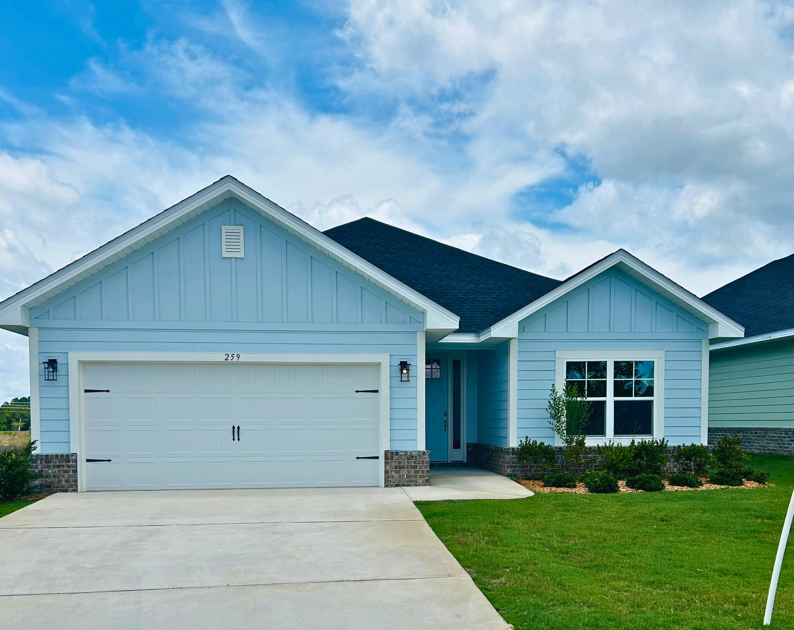 Limited-time offer: Receive up to $45,000 price discount on this home. Ask about our 3.99% interest rate buy down promotion with our preferred lender. **Community also has USDA financing with zero down payment for those that qualify. **
New Craftsman style home with a brick skirt and hardiboard siding.  20 minutes to Blue Mountain Beach on the Gulf of Mexico, or 15 minutes to DeFuniak for shopping at Lowes or WalMart, etc.
 3 BR / 2 BA with 2 car garage + garage door opener, cathedral ceiling, 8' entry doors, large covered rear patio 15' x 9', quartz countertops, CoreTec Pro Plus Luxury Vinyl Plank flooring throughout, no carpet.  Separate garden tub + shower in Master Bath, Moen faucets, lever handled hardware, attic pull-down stairs.  Fully sodded yard with sprinkler system, well an