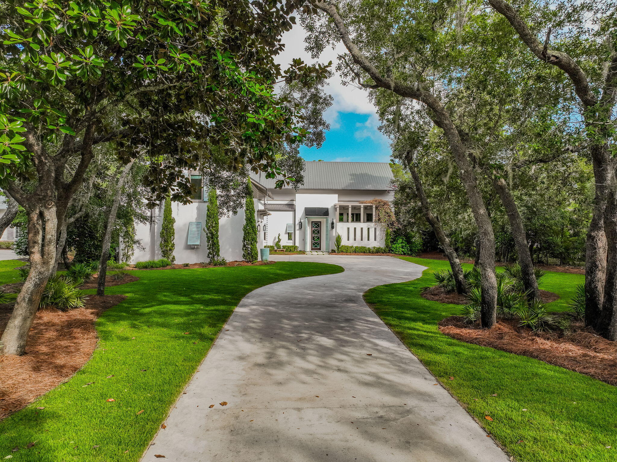 Boater's Dream in Botany Bayou - Luxury Meets Location

Welcome to this extraordinary, fully furnished, waterfront retreat in the secluded, gated enclave of Botany Bayou — ideally located between the bay and Scenic 30A. Set on nearly an acre and offering deep water access, this stunning 4,351 sq. ft. residence was fully remodeled in 2019.

This 4-bedroom, 4.5-bath home features a dedicated office, media room, and soaring vaulted ceilings with exposed beams that elevate the light-filled, modern interior. High-end finishes include shiplap walls, custom lighting, hardwood floors, and a beautiful fireplace that anchors the main living space.

The chef's kitchen is equipped with top-of-the-line appliances, including a Sub-Zero fridge, Wolf gas cooktop, Bosch dishwasher, Scotsman ice maker, Wolf built-in coffee system, and wine fridge. The spacious primary suite is located on the main floor and features his-and-her walk-in closets and a spa-like bathroom retreat.
Upstairs, you will find two additional guest suites with en-suite bathrooms, a media room with a wet bar, and a cozy bunk room with matching sets of built-in bunks. 
Step outside and experience the ultimate in outdoor living: a custom negative-edge pool and spa, summer kitchen, fire pit, and private dock with boat lift and jet ski lift, all set against the tranquil backdrop of the bayou.