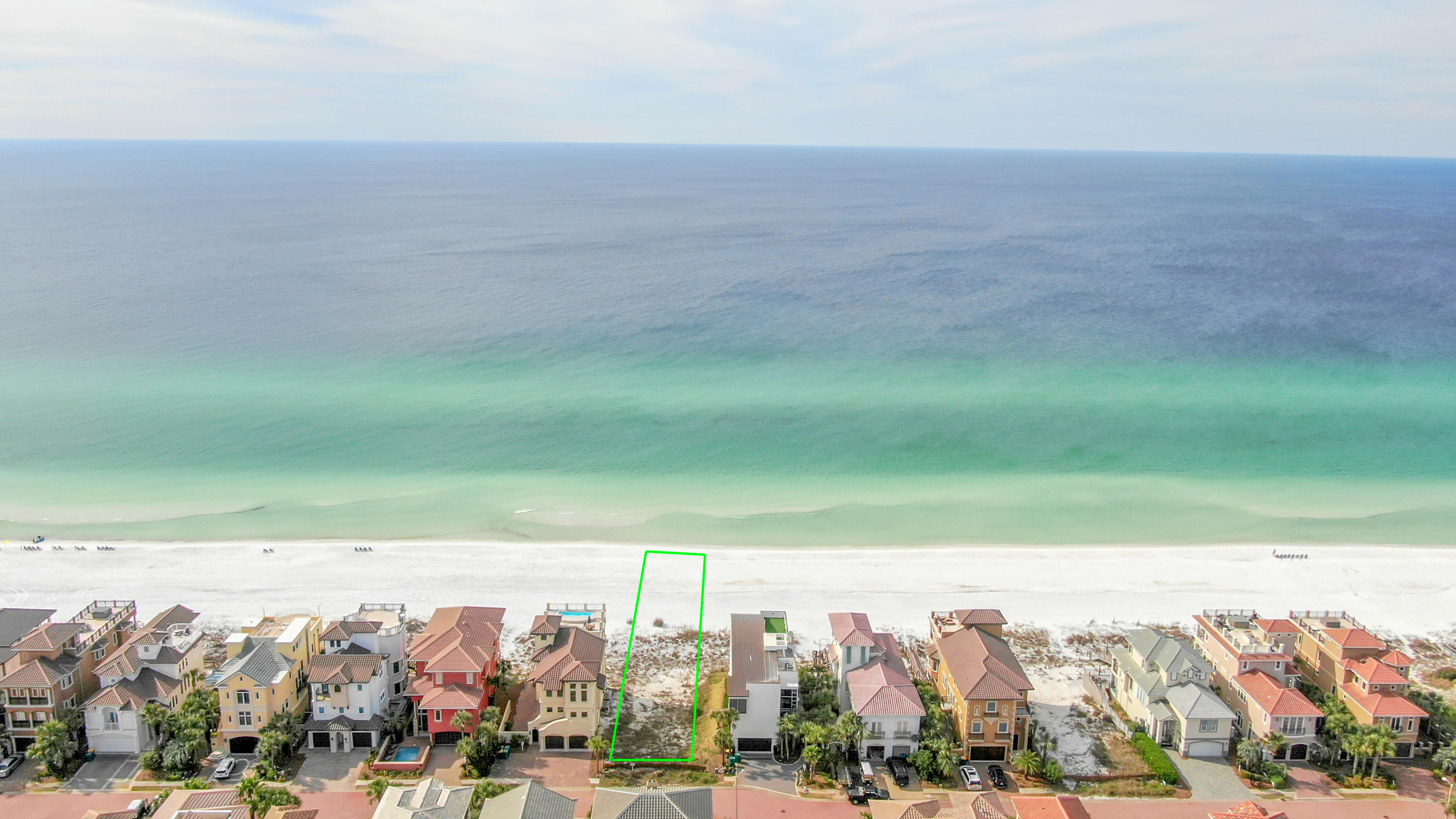 This is one of the last 4 GULF FRONT lots and the only listed in Destiny By the Sea. Forever view of the Gulf of Mexico while you are either inside or on the terrace of your luxury beach home. The exclusive gated community of Destiny by the Sea is a guard gated community and offers amenities as a heated community pool, and spa, 2 beach accesses and more. This highly desirable community is located right in the heart of everything Destin & Miramar Beach and can bike or golf cart ride to nearby shopping and great local restaurants. The sparkling emerald waters of the Gulf and your private sugar white beach will provide endless panoramic views.  Seller has a HOA approved house floor plan that is 4089 sqft & will turn over to Buyer if wanted or Buyer can pick own HOA approved plan. This is a high end very guarded subdivision and prime location for a second home, vacation rental, or primary residence.