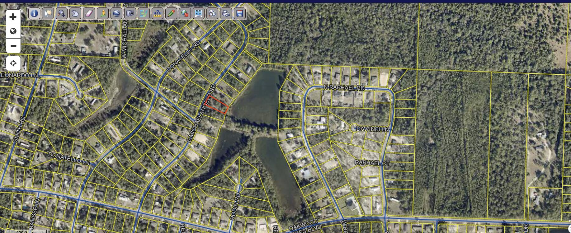 Rare waterfront homesite on a 5± acre pond offering flexible use and long-term investment potential. Mobile homes are permitted, creating an accessible path for affordable housing or future rental use (buyer to verify). Peaceful water views with a convenient location just minutes from downtown, shopping, and major services. An attractive option for owner-occupants or investors seeking a lower-cost entry point with potential income appeal. Priced to sell.