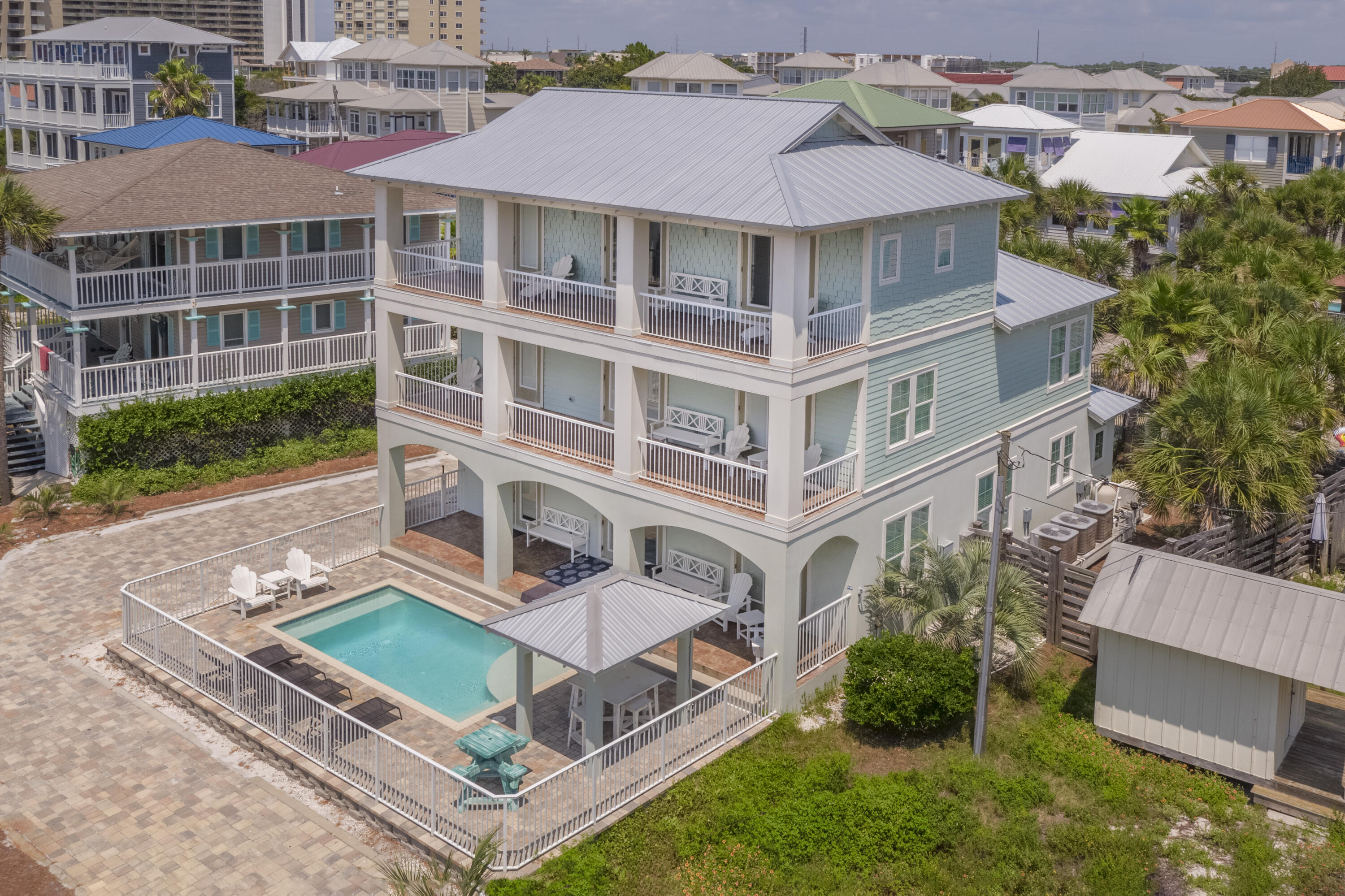 This magnificent beach home in the heart of Miramar Beach features 7 bedrooms & 6 baths to accommodate up to 21 guests. ''Breeze on Inn'' is professionally decorated including marble counters, stainless appliances, tile throughout & a private pool with veranda & gazebo for your relaxation when not lying on the beach which is directly across the street. 1st Floor has Kitchen, Den ,Utility Room, King & Queen w/full baths. 2nd Floor has a second Den, King Bedroom w/Twin Sleeper, Bath, Bunk room, King Bedroom w/bath, & the 3rd Floor features a Sitting Area with Two Twin Sleeper Sofas, & 2 King Bedrooms with baths. Home has been impeccably maintained and shows like new. Close to all the Emerald Coast has to offer, this home is the ideal investment or second/primary home opportunity. Call and schedule your viewing today. Potential Buyers or their Agents should confirm all information to their satisfaction.