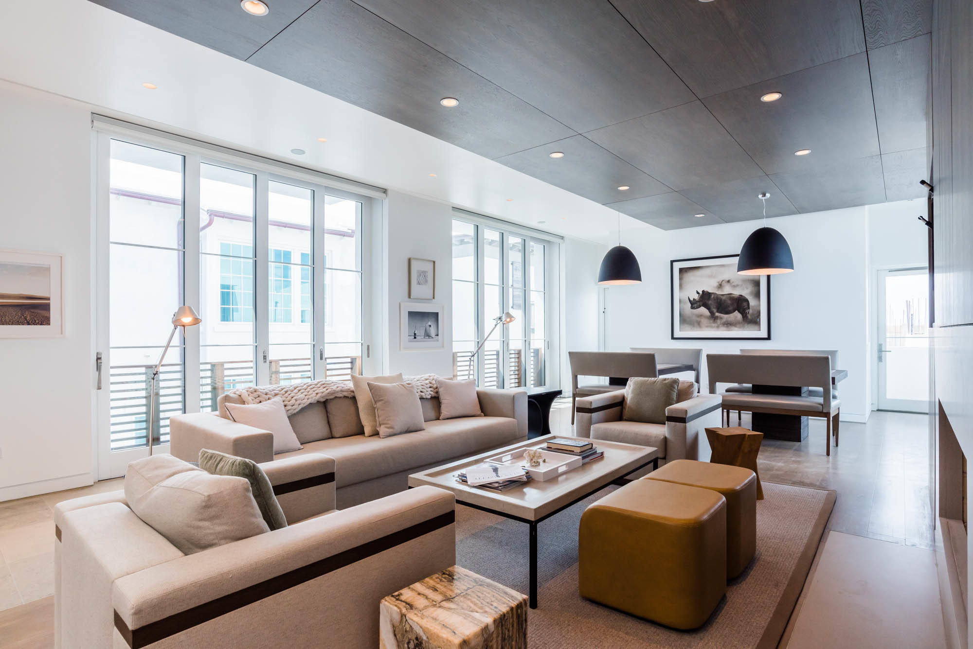 Modern elegance meets the sea. 13 Sea Venture Alley, designed by Kinney Morrow Architecture, constructed by Galvas Construction with impeccable interiors created by award winning Musso Design Group, marries exquisite design with the abundance of outdoor and indoor spaces.
Four bedrooms and a bunk room are well placed within the home to maximize privacy with each one. Nothing is repeated from bed to bath in the home. Distinct tiles and backsplash represent each of the bedroom's character. Naxos Marble along with Athens Cream Marble are just the start. Two of the bedrooms are detached private suites with private entries to the living areas of the home.
The first floor entry court is privatized by beautiful reclaimed Swamp Cypress gates for enjoyment of the courtyard loggia and po The first guest suite and bunk bedroom flank the courtyard perfect for visiting guests. Rising to the second floor via stair or elevator brings you to two additional guest bedrooms and the master suite that features protected Gulf views. Lift & Slide doors open for cooling winds provided by southerly Gulf winds when the weather is perfect.

The kitchen, living room, dining room and Sea Loggia occupy the entire third floor. Lift & Slide doors open east to west through the main living area allowing for the cool Gulf breezes to pass through the home. The Sea Loggia features an enchanting outdoor fire place and summer kitchen with an Evo Affinity Professional grill. From the kitchens scullery to the summer kitchen off the main living area outdoor loggia you can dine in the open air while watching the sun set over the Gulf of Mexico.

The fourth floor roof top terrace with heated pool overlooks the horizon of the emerald waters of the Gulf of Mexico. Sunsets, star-gazing, and viewing of the occasional meteor showers punctuate the perfectness of this incredible home.