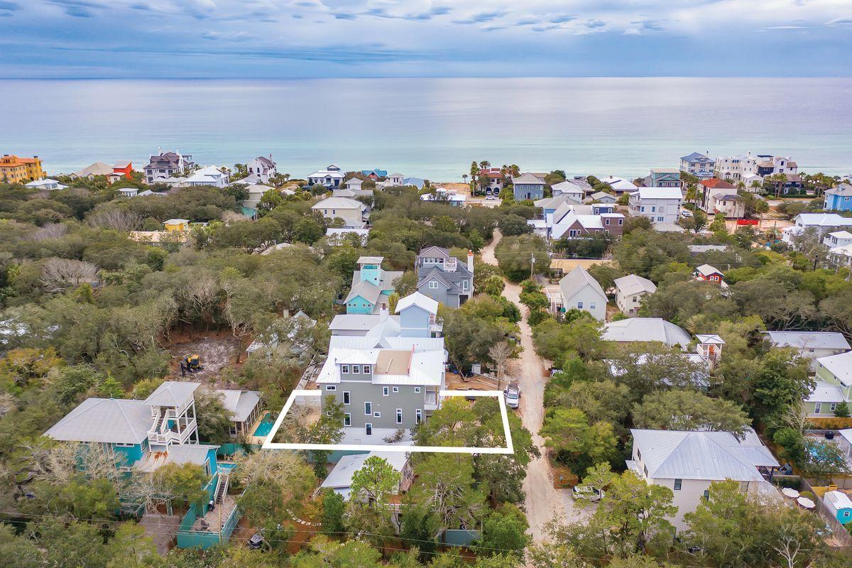 Situated in the heart of Old Seagrove West of County Road 395, this exemplary new construction is characterized by ample open living space including a sprawling fourth story rooftop deck as well as panoramic views with corridors of the gulf of mexico and seaside town. Located only a few blocks from Seaside, FL, this six bedroom (plus two bunk spaces), eight bath home features an impressive three story vertical footprint with open living space and resort style amenities including an oversized heated pool with adjoining spa surrounded by a lush, private outdoor living area. This property was designed as a legacy compound with multiple uses including the opportunity for short term rental yield as well as comfortable family living. Other notable features include a spacious garage, ample parking, private elevator and plush luxury finishes. Thyme Street offers excellent beach access less than two blocks away and close proximity to Seaside, Watercolor and all of the world class shopping, dining and entertainment that 30A has to offer.