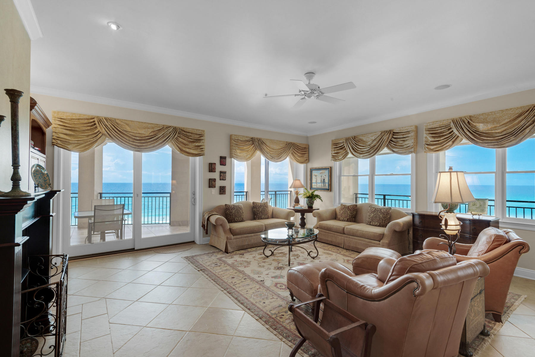 Welcome to Bella Vita C203 in Blue Mountain Beach on 30A with sweeping views from almost every room. This immaculate and gently enjoyed 3,185 sq. ft. gulf front 4 bedroom 4 bath condominium home competes with a single-family gulf front residence touting over 60 feet of direct gulf frontage wrapped with 972 square feet of balcony--offering endless views from Panama City Beach to Destin. Rising above the beautiful white sandy beaches this second floor beach front residence is being offered fully furnished and lives like a luxurious one level beach house with the convenience of luxury condominium living.  Three true gulf front master suites feature dual vanity sinks, separate shower, jetted tubs, water closet, and walk in closets. Master suites, living and dining room let onto an expansive balcony overlooking the Gulf of Mexico. The fourth bedroom, ideal for a queen bed, bunks or an office, adjoins a full bath.  The well- appointed Linn's Prestige kitchen opens to dining and living with sweeping gulf views.  Bella Vita C203 also features a gas fireplace, underground parking and ample storage.  Bella Vita is a gated condominium with only 48 residences and is located on the highest point on the continental US Gulf Rim and enjoys 360 feet of beautiful beach. The Great Hall overlooks the piazza with fountain and features conversational seating areas, patio, kitchen, library and reading room. Active lifestyle options include a state of the art Fitness Center, and 2 pools (one heated). Paddleboard or kayak from the beach or spend an afternoon biking along Scenic 30-A's bike trail. Discover nearby coastal towns, shops and enjoy casual and fine dining then retreat to the privacy of your gulf front balcony.  We invite you to make an appointment to see C203 and begin to live the Beautiful Life at Bella Vita!