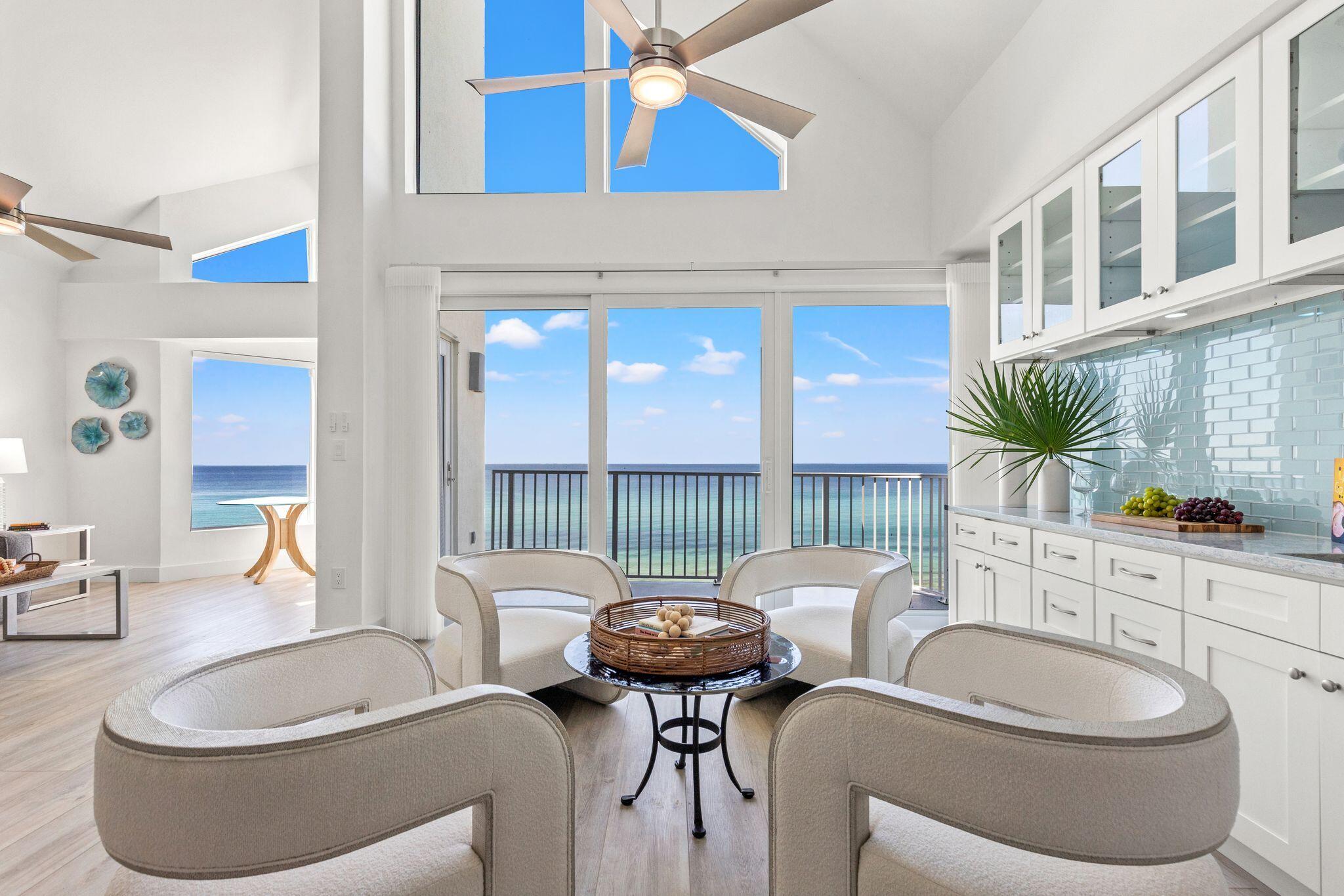 Experience gulf-front living at its finest in this newly remodeled top-floor condo at Tranquillity On The Beach, perfectly located on the East end of 30A. This stunning two-story condo offers panoramic Gulf views and has undergone a complete interior and exterior renovation, making it feel like a brand-new home. Featuring 3 spacious bedrooms and 3 full bathrooms, this residence is designed for ultimate comfort and relaxation.
The upstairs master suite boasts new floor-to-ceiling windows, providing a seamless, uninterrupted Gulf view so you can wake up to breathtaking vistas right from your bed. The ensuite bath offers both privacy and style, creating a true retreat. The kitchen has been fully updated with sleek cabinetry, modern smart appliances, and a breakfast bar ideal for entertaining. An open living area showcases soaring ceilings, abundant natural light, and walls of glass framing the turquoise waters beyond.
Every detail has been thoughtfully upgradedfrom new impact windows and doors throughout to smart-home technology that controls appliances, lighting, thermostat, and more, all accessible via an included iPad. A Sonos sound system with WiFi speakers is also integrated, making entertaining effortless.
Tranquillity itself has completed a complete exterior transformation, including a new roof, new balconies, fresh paint, resurfaced pool, waterproof-coated walkways, and updated exterior lighting. All assessments have been paid, ensuring peace of mind for the next owner. Additional conveniences include one assigned parking space plus access to an overflow lot just north of 30A, private storage, and a gated, low-density community setting.