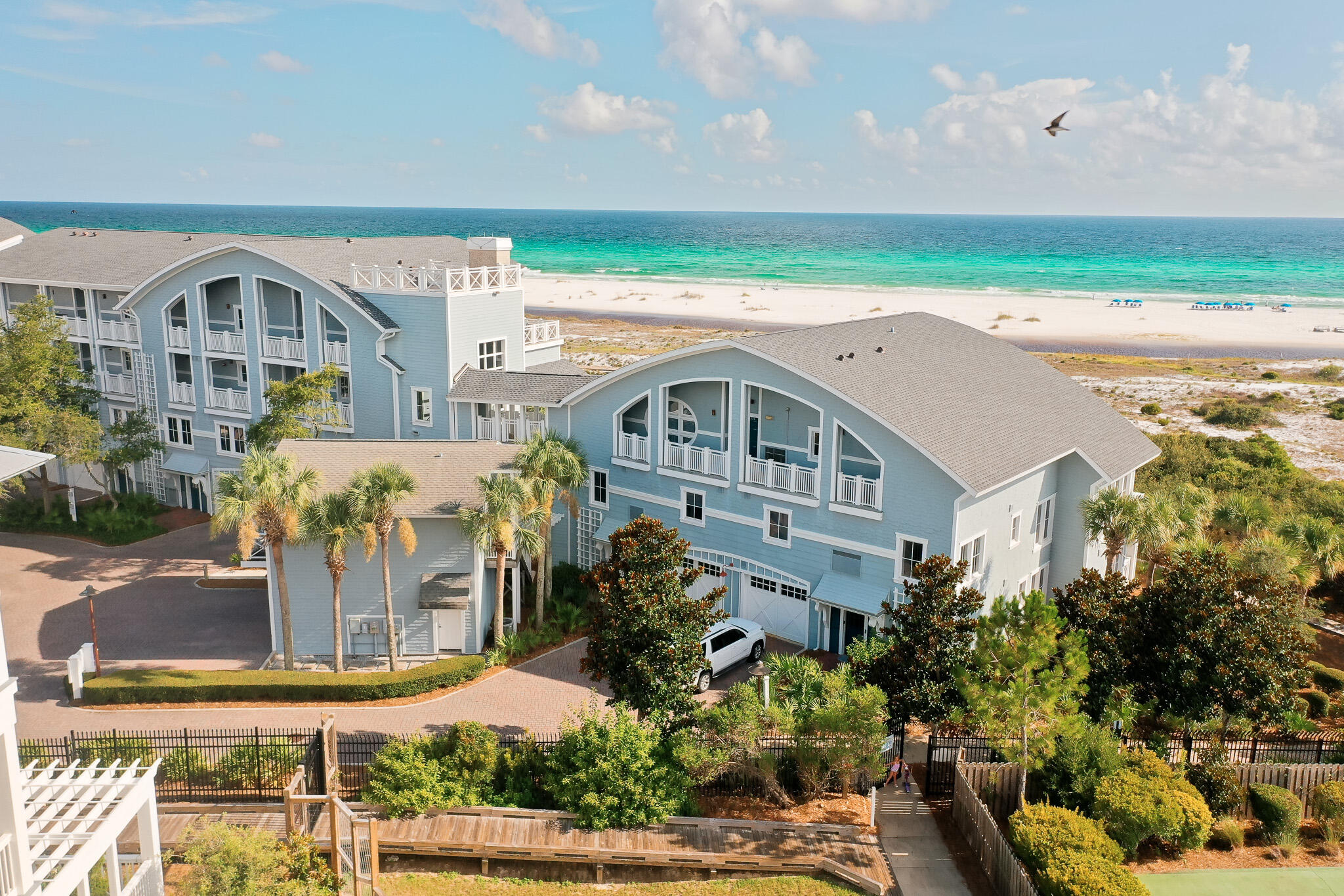Tucked behind the protected dunes of WaterSound Beach, 429 Bridge Lane, Unit A114 isn't just a residence—it's a front-row seat to the rhythm of the Gulf, where mornings begin with sea-glass skies and evenings end in a hush of ocean breeze and golden light.

Spread across two thoughtfully designed levels and over 2,600 square feet, this rare corner unit has been freshly reimagined for effortless coastal living. Every space speaks in soft, sun-washed tones—new flooring underfoot, fresh paint on the walls, and curated furnishings that feel both elevated and entirely at ease. This home is move-in ready, yet deeply personal in its details. Step into the main living space and you're immediately met with sweeping views of the Gulf. Large-scale windows invite the outside in, blurring the line between interior elegance and natural splendor. The open layout is designed for connection: a spacious living room flows into a dining area that feels like it was made for long dinners and even longer conversations. Just beyond, a chef's kitchen blends form and function with high-end appliances and custom finishes that make cooking a joy.

Each of the four bedrooms offers its own sanctuary, complete with ensuite baths that echo the calm of a boutique spa. Whether hosting family, welcoming friends, or simply finding space for solitude, the floorplan is as adaptable as it is generous.

Outside, a private terrace frames the viewsky, sea, and sand all unfolding in quiet perfection. It's not just a place to sit. It's a place to slow down, to breathe deeply, and to remember why you chose this coast in the first place.

Set within the Crossings at WaterSound Beachan architecturally significant community designed by Graham Gundthis residence benefits from rare privacy and protected sightlines. With access to premier community amenities, scenic bike trails, and the acclaimed WaterSound Beach Club, life here feels both grounded in nature and elevated in every way.

An attached garage, ample storage, and a low-density building design add practicality to the poetry. 

This is more than a luxury condominium, it's a legacyan invitation to live well, surrounded by beauty, and anchored by intention.