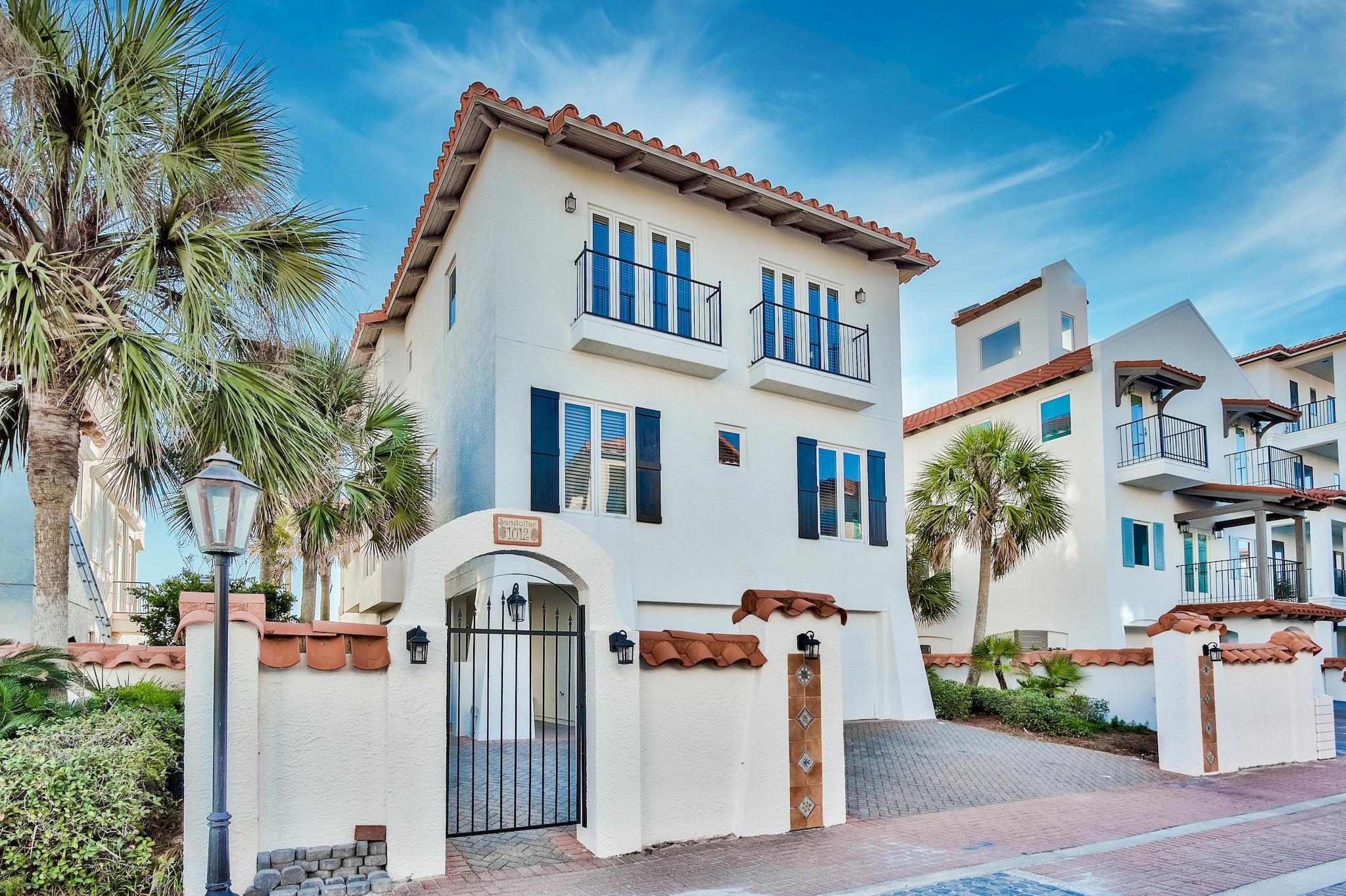 Luxury beach living at Vizcaya with views that will take your breath away! This home has everything that you would want in a beach retreat.  The expansive porches boast stunning views from multiple levels of this three story beach home.  A built-in grill on the upper deck with a propane grill & a ceramic egg smoker provide for optimal grilling. The home has a total of 4 bedrooms, all with en-suite baths, as well as a bonus room that would be an easy bunk room conversion.  You will also find a 1/2 bath on the first & second levels. The 2nd floor has an open floor plan which connects the kitchen to the dining and living area. The living room has stunning gulf views with a cozy fireplace for the winter months. New flooring recently installed along with decorative updates...move-in ready! Vizcaya at Dune Allen is a gated Gulf front community perched on sugar white dunes overlooking the emerald waters of the Gulf of Mexico. This quiet oasis with only 32 residences offers a private community pool with bar area, pool cabanas and three beach walk overs providing easy access to 1,000 feet of beach frontage for your personal enjoyment. 

This is a phenomenal opportunity to own your own piece of paradise.    *All dimensions are approximate and should be verified by the buyer*