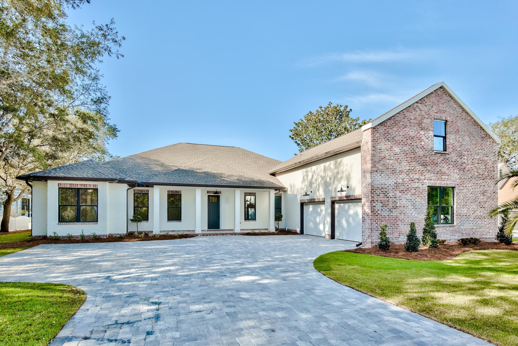 New Construction – Custom Built Waterfront Home in Destin, Florida by Reiker Homes!  Style meets comfort in this family friendly home that offers one story living with an additional bonus space over the 2-car garage.  This spacious home has 4 bedrooms and 4 ½ bathrooms with 4,569 square feet of living spaces and beautiful covered porches off the front and back of the home.  Water views abound from the moment you enter the foyer and continue into the open floor plan living room that boasts a fireplace and built-in cabinetry.  The chef's kitchen includes a breakfast nook with beautiful natural light and views.  Outdoor views continue into the owner's suite which connects through to the laundry and drop station.  The Florida lifestyle will be easy to enjoy with this home's outdoor kitchen, wa waterfront pool and boat dock.  Construction is estimated to be complete in approximately 2 months.