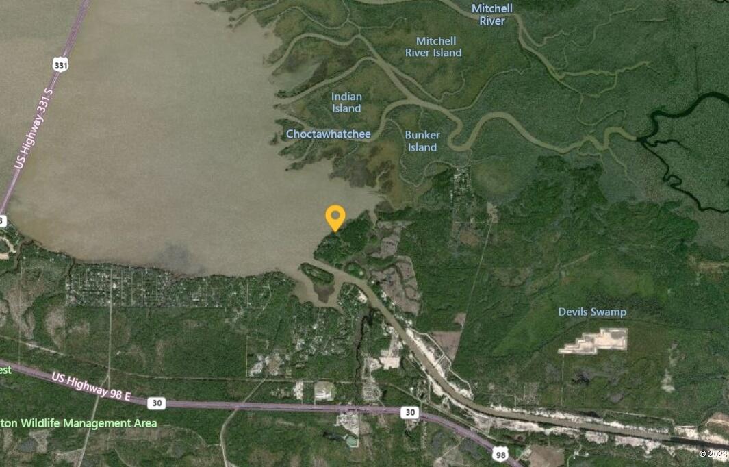 Waterfront dream home site available with owner financing. Family owned since 1989 and first time listed. This 1.2 acre gem is ready for your dream home or boating getaway.  This lot features over 100 feet of bay frontage with close proximity to the intercoastal waterway. This is one of the lowest priced (if not the lowest) one acre plus parcels on the Bay. Buyer to verify measurements and all pertinent information.