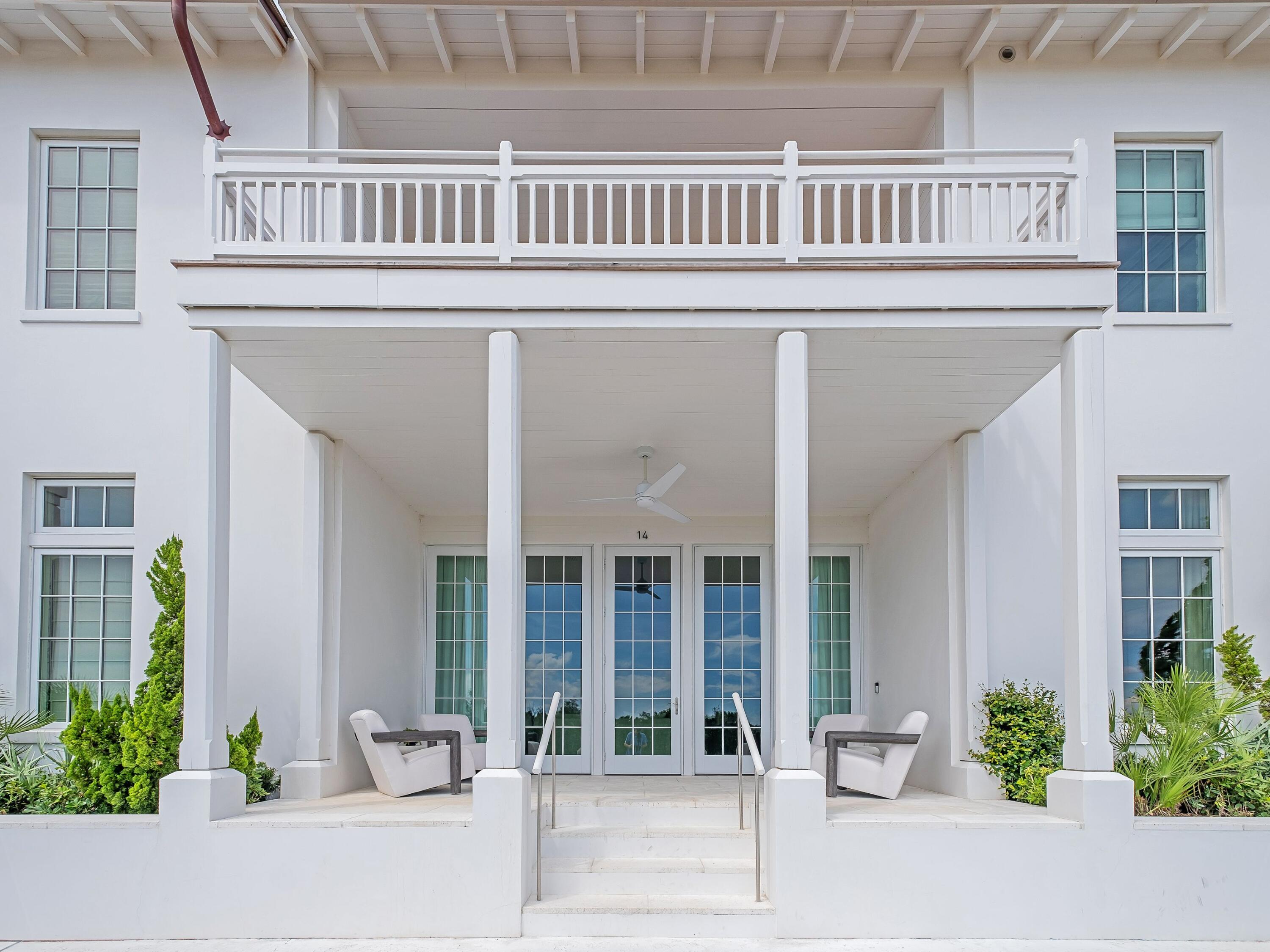Built-in 2022, this gorgeous Mews-style townhouse in Kaiya Beach Resort brings a sophisticated elegance to the beach. Stone, tile and white oak flooring add a touch of luxury to each room, along with accent wallpaper and pristine white decor. A wall of windows and French doors connect the bright, open living room with a deep outdoor porch, providing a tranquil spot for quiet reading, sunset cocktails and social entertaining. The adjoining kitchen of this luxury retreat features a long island with bar seating and full-height cabinetry with under-lighting. Caesarstone counters and high-end Sub-Zero and Wolf appliances complete this custom space. Tucked away in the corner is the dining nook with comfy bench seating, shiplap walls and a gorgeous outlook. A neat coffee station completes this upscale culinary space. The first floor is completed with a beautifully decorated guest bathroom and a two-car garage. Head upstairs to the landing, which features a built-in desk with ample natural light from the skylight above. Guests can sleep soundly in the guest bedroom or the bunk room, which is furnished with two custom twin-over-full bunks. The primary suite has ample space for a king-sized bed and an additional seating area. Doors open onto the second-floor balcony, where sea breezes playfully embrace the generous outdoor sitting area. Attractive oversized tile showers, marble vanities, designer wallpaper and Waterworks fixtures grace all three luxury bathrooms. This exclusive coastal haven has equally upscale amenities, including a beautiful community pool, spa, exercise room and pavilion. The soft white sandy and emerald gulf waters provide further delights at this sought-after beach retreat. This property is fully furnished and turnkey, equipped with all furnishings, linens, dishware, and essentials for seamless rental use.