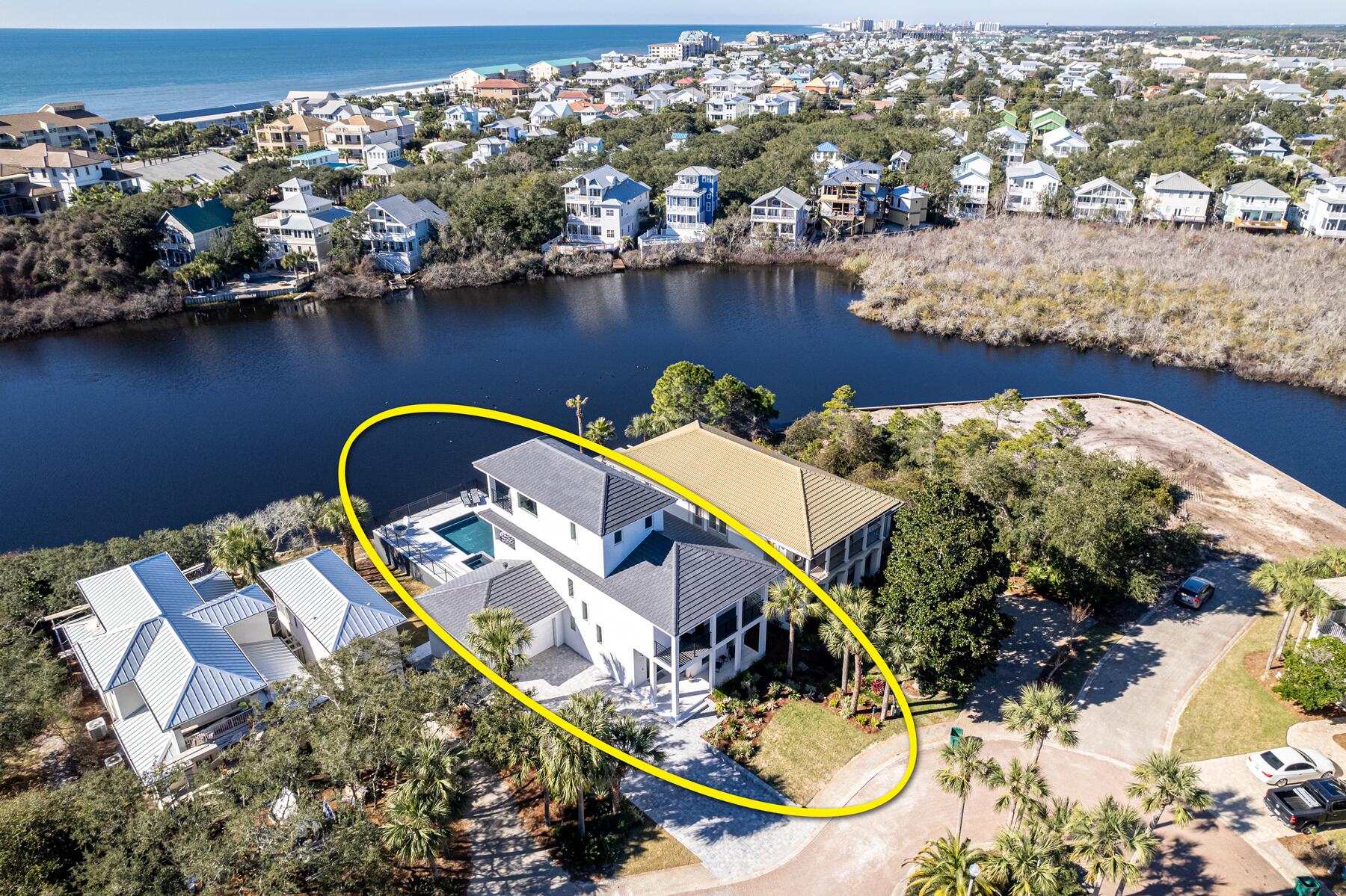 MUST SEE, OUTSTANDING QUALITY, COMPLETELY RENOVATED INSIDE & OUT, FURNISHED, TURN-KEY LISTING WITH VIEWS OF THE GULF! Extraordinary renovation with discerning attention to every detail across the street from the white sands of the emerald gulf waters! Upon entering the three story home, the ''sinker'' cypress beams, cypress coffee bar and third floor cypress cabinetry elevate the expectation bar. Every electrical outlet, light switch, light fixture, fan, and plumbing fixtures throughout the home are new and demonstrate a specific interior design by a discerning remodeler. 

The White Oak wood flooring, custom metal interior railings and balcony railings are of exceptional quality. The kitchen is wrapped in Wolf & Sub-Zero appliances and boasts a ten-foot island, with quartz waterfall edges, which match the counters in the kitchen and laundry. Intimately designed baths, exhibit fabulous tiles, custom vanities, and frameless glass surrounds. Every interior wall is clad in premium white shiplap and all ceilings, both interior and exterior are clad in stained tongue & groove premium wood. Linier den fireplace is clad in modern tile & custom black wood facade. New tankless Navien delivers constant heated water to all four baths. The outdoor Primo Komado is ready for poolside grilling at its finest. 

The new pool and eight person spa offer modernized engineering, technology, and design, including all functions controllable via remote app, such as the ambient LED lighting and heating. The pool is more than a "pool", it has a tanning ledge, pool umbrella station, and ample swim ability. The pool is surrounded by large white fire-rock pavers, with a natural gas firepit on the pool's deck ledge. 

The entire exterior of the home displays new smooth coat hard stucco, with all new impact insulated hurricane rated windows and doors. Every window, exterior door, and balcony has been professionally waterproofed and sealed protecting the home's facade from the gulf winds and rain. The home also has a new tile roof and garage doors.  

This extraordinary lakefront home is located on a quiet cul-de-sac street, in sought after beach front gated community, Destiny West. It has a community clubhouse, pool, tennis courts, and gym offering a gorgeous view across Sunset Lake to the Gulf of Mexico in three of its five bedrooms and balconies. The home is  within a short walk to the spectacular beaches of the Emerald Coast of Florida! 

Please inquire for further details, and to schedule a private showing.