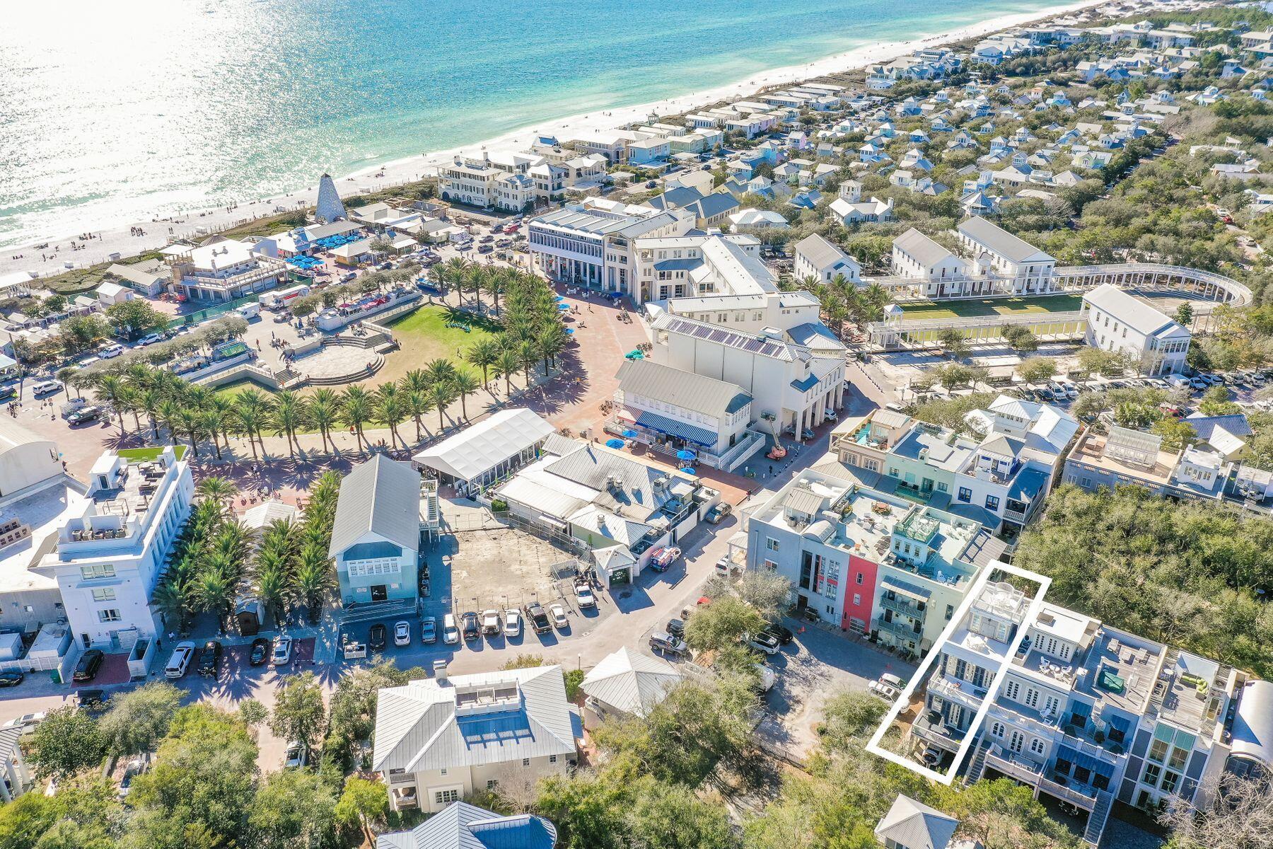 Light-filled rooms, hardwood flooring and multiple balconies offering panoramic views are just a few of the features this rare mixed-use property provides. The property offers limitless commercial/residential potential with currently occupied commercial space on the first level. Just above, three additional floors and a rooftop viewing deck create a unique residential retreat in the heart of Seaside, Florida. From the immaculate open living area on the second floor to the lofty tower balcony, this award-winning home inspires a lifestyle befitting its enviable Seaside, Florida location. On the second floor, Pecky Cypress beamed ceilings and a succession of 12-foot-high floor-to-ceiling windows provide a sense of limitless space in the dining room and sitting area. Ebony-stained flooring continues in the fully-equipped kitchen with marble-topped island and hide-away storage. On the third level, a trio of French doors in the master bedroom stand open to catch gentle sea breezes rustling through the treetops. The adjoining balcony provides a peaceful refuge for relaxing while the rooftop wraparound deck is designed for sunset gatherings with friends and enjoying views of the Gulf of Mexico and nearby Ruskin Place Park.