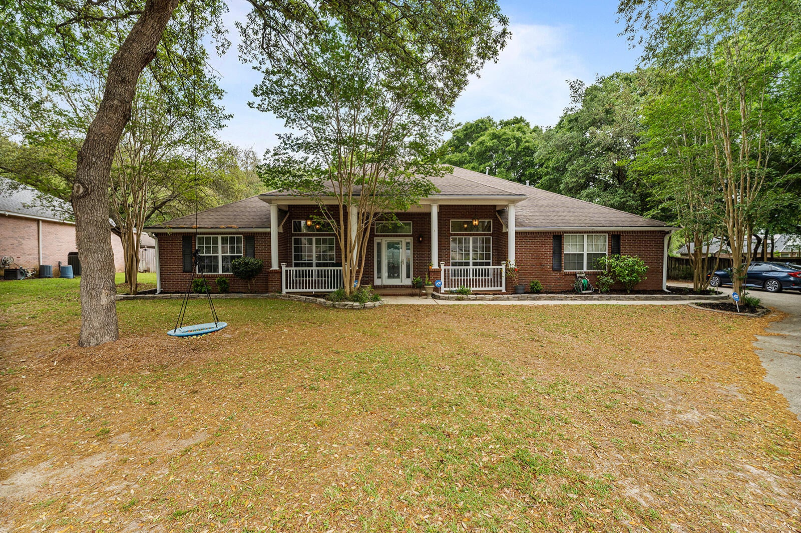 All brick 5 bedroom, 3 full bath. Crown molding compliments 10 ft+ ceilings. Chef's style kitchen, SS appliances, gas stove, dbl. oven & more. Tiled flooring in wet areas. Large master bath with garden tub, separate shower, double vanities & large walk-in closet.  Enclosed, attached screened patio compliments the back of the home. Direct access to a full bathroom from inside the patio & a large gazebo in the center makes the back yard perfect for entertaining. Brick shop. Quiet subdivision with no HOA. Red lights at Live Oak Church Rd & John King intersections make access to & from Hwy 85 convenient. Seller to have new roof installed once under contract~ This home is perfect for your family and convenient to shopping, schools & dining~ This home offers comfort and elegance~