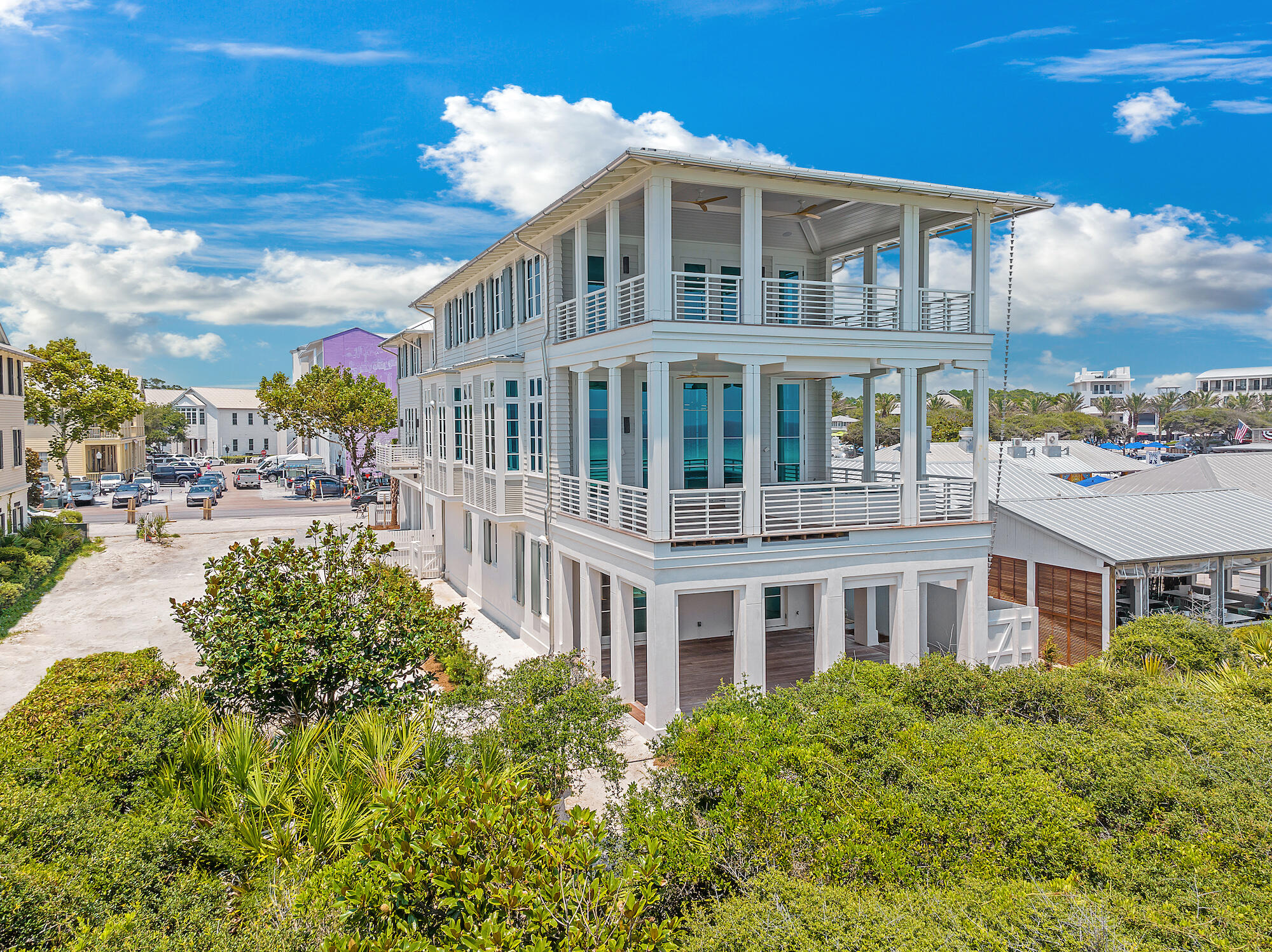 The wait is over for the crown jewel of Seaside, Florida, with construction completed this stunning gulf-front home is ready for memory-making among unparalleled amenities and the New Urbanism lifestyle. Marked by an oversized footprint and sweeping vistas, this extraordinary opportunity is aptly named ''The Cerulean'' for its unimpeded views of the shimmering blue-green waters of the Gulf of Mexico. The home was designed by Eric Watson and built by Dune Construction and Development LLC with interiors carefully curated by Erika Powell of Urban Grace Interiors. Perched on a premier gulf-front lot in Seaside, Florida, this six-bed, six-and-a-half-bath retreat occupies a generous space from 30A to the sand dunes on the west side of Coleman Pavilion. The first level boasts a plethora of sleeping accommodations with a gulf-side shuttered veranda for enjoying salty breezes. A private elevator whisks you to the second level and the heart of the home, with seamless integration from the dining space to the well-appointed kitchen and back again. Dramatic interiors replete with natural light bring the outdoors in. The great room with fireplace provides a blank canvas flanked by sparkling sea views for comfortable entertaining steps from a second-floor gulf-front pool. Venture to the third floor for the spacious owner's retreat, a respite with a private covered porch. The main home is attached to a 1,398-sq.-ft. carriage house with two beds and two baths on two levels, positioned above a two-car garage. From gulf breezes to easy walkability to a host of boutiques and restaurants, The Cerulean is certain to become a landmark in an already iconic coastal community.