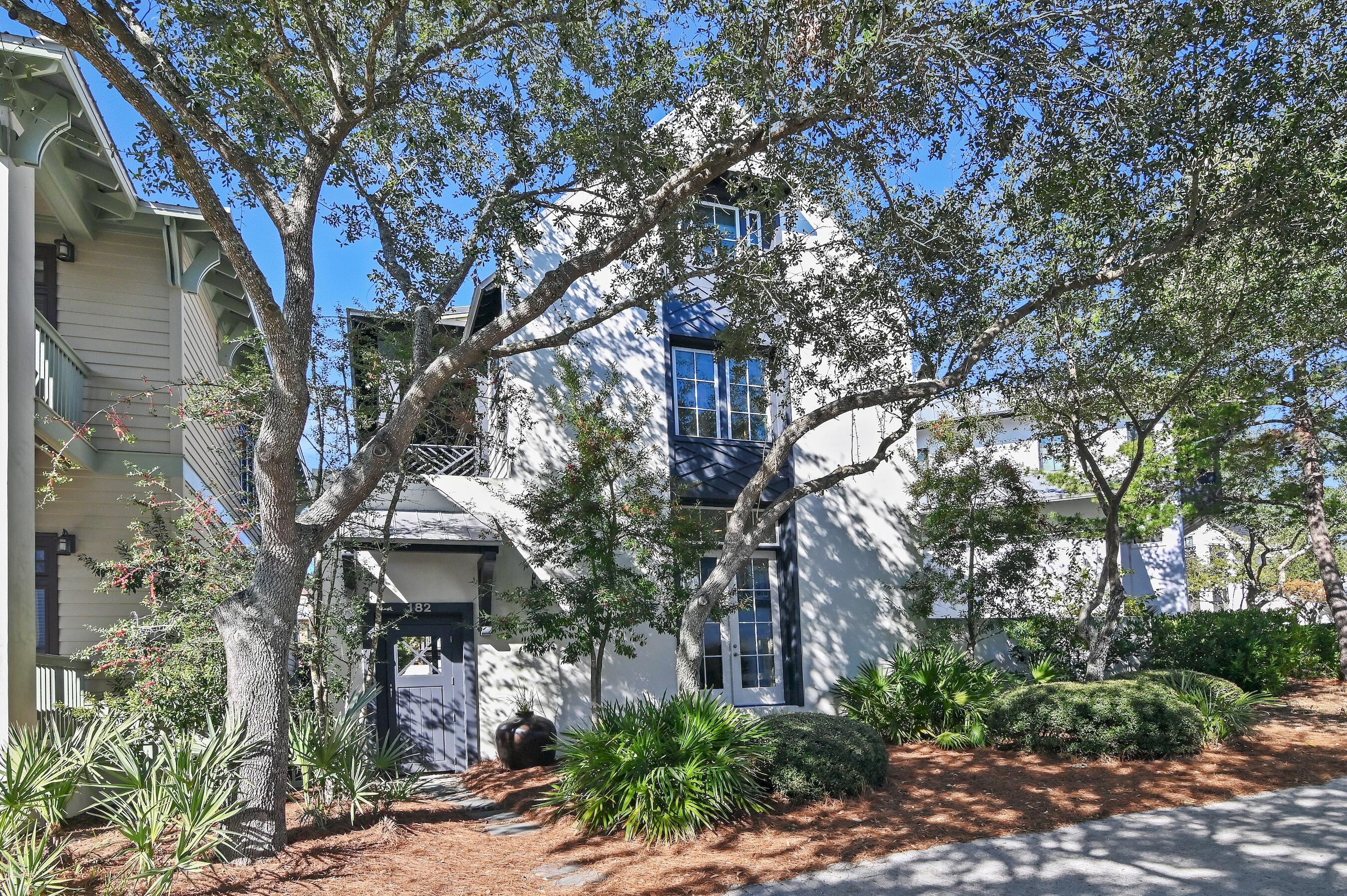 Excellent Investment Opportunity! Solid rental History of $200k-$235k/year. Seller Financing & continued management at 10% an option. This home was designed to capture the essence of coastal living. The open floor plan flows effortlessly from the living area to the covered porch and courtyard, where a Private Pool enhances the indoor-outdoor connection. The courtyard creates a serene, private retreat, perfect for relaxation, entertaining, or dining al fresco.
Ideally situated in the quieter, less-traveled area of Rosemary Beach, this home offers an ideal balance of privacy and convenience. Just two blocks from the Fitness Center, Sky Pool (indoor), Owners Club, and Racquet Club, you can easily walk the boardwalk to beach access. Enjoy world-class amenities right at your doorstep. The architectural design of this home draws inspiration from the timeless styles of the West Indies and New Orleans, blending elegance with Southern charm. The exterior showcases a combination of wood siding and stucco masonry, offering a perfect balance of warmth and sophistication. Cantilevered porches and French doors accentuate the balconies, enhancing the home's coastal allure.
Inside, the home features 12-foot ceilings that create a spacious and airy atmosphere. Coastal hardwood flooring throughout, perfectly complementing the natural light from the large-scale windows. A striking wrought iron railing stairwell gracefully leads to the upper levels. The living room is centered around a cozy fireplace, offering a warm and inviting space for relaxation. The property also offers the potential to add a carriage house with a two-car garage. This home is offered fully furnished, with an established rental history and 240K pre-bookings secured for 2025.