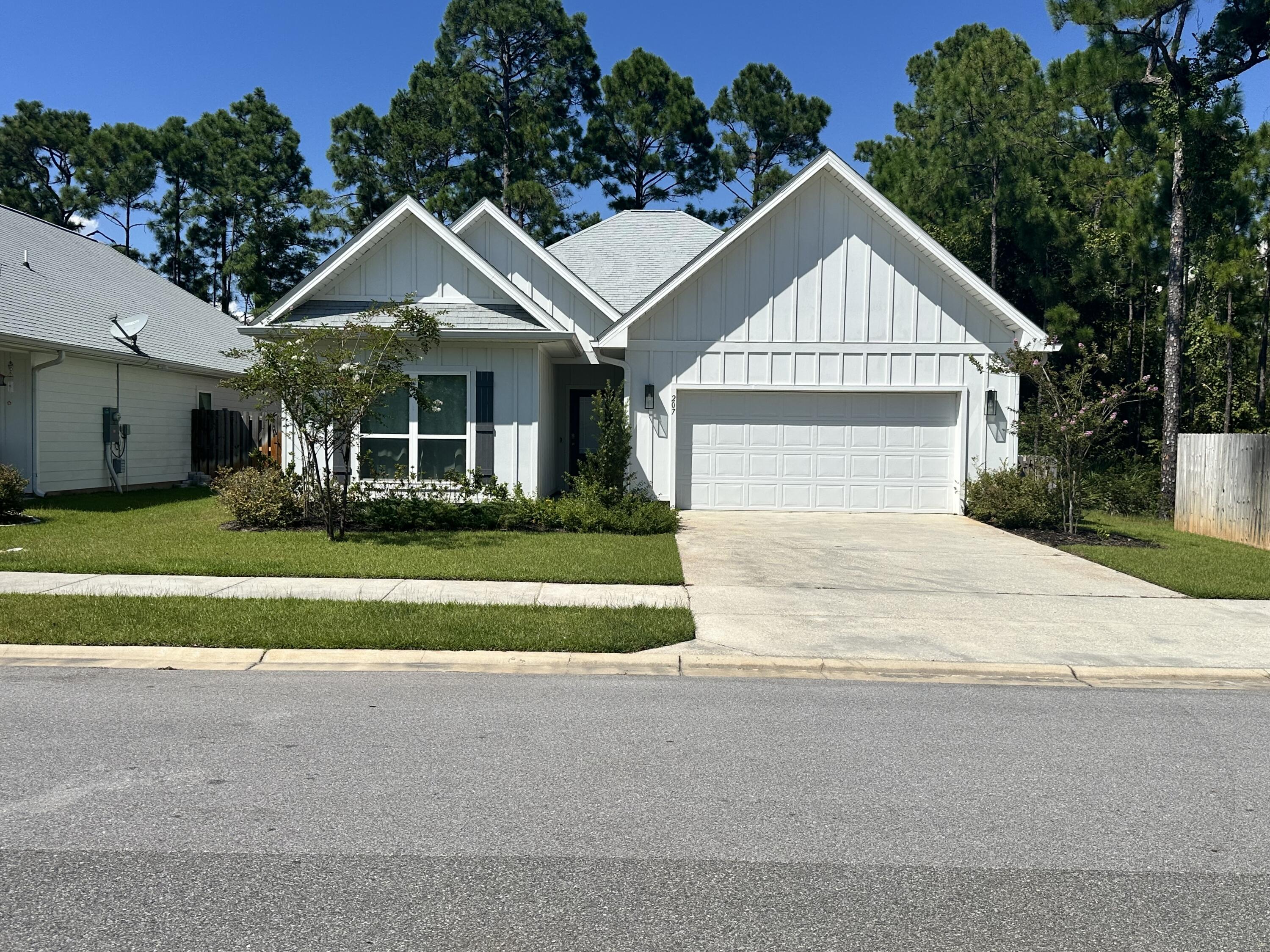 Beautiful, recently built,  5 bedroom, 3 bath house convenient to shopping, dining, state parks and the beach. This home comes partially furnished. The living room, two bedrooms and one office have been furnished and ready for move in. There is LVP throughout the entire home.  The home also  features Stainless Steel appliances and beautiful granite countertops as well as a fenced in backyard. Washer, dryer, and alarm system included. Internet, garbage and pest control included in rent.