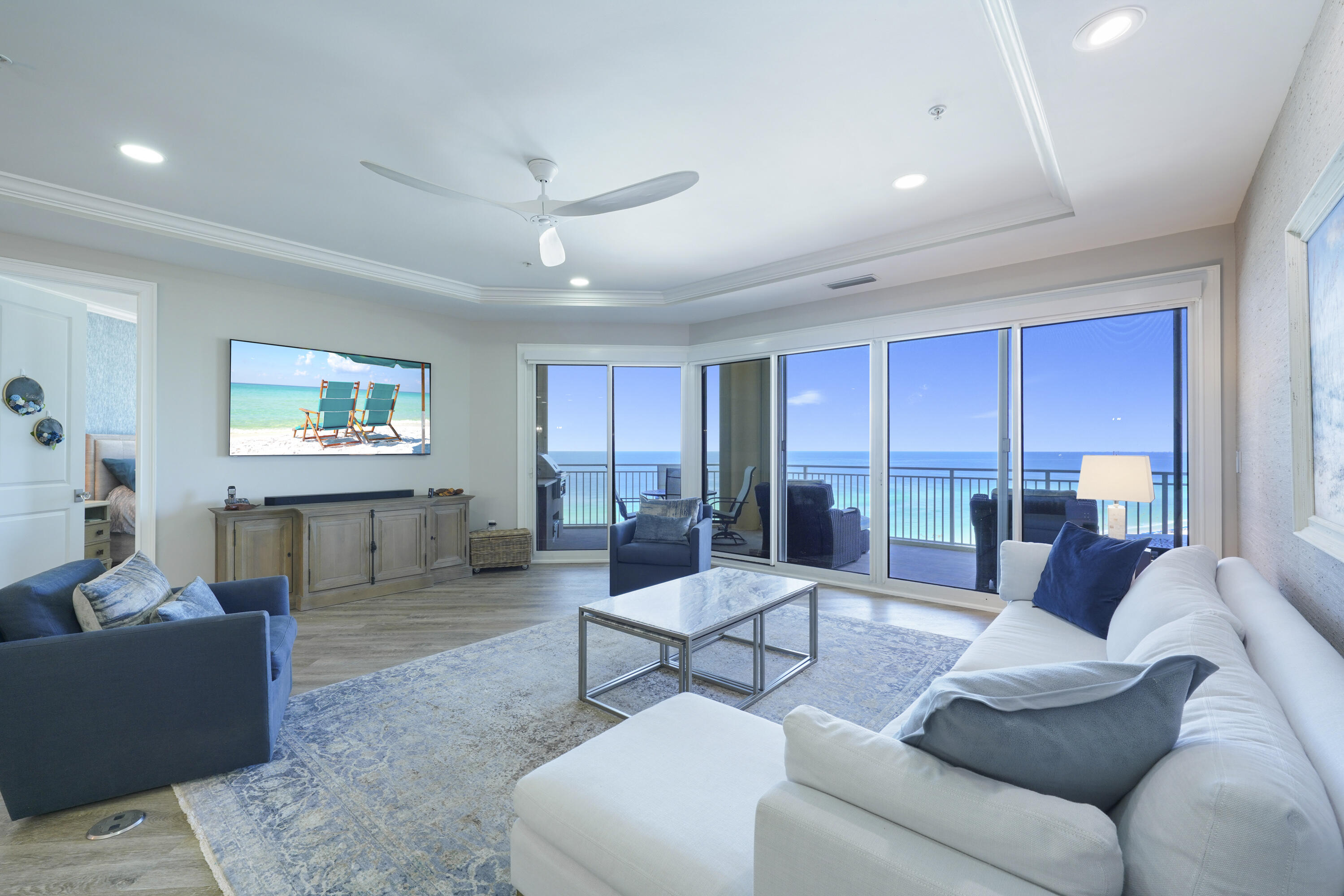 Presenting an exquisite 9th-floor Villa at Grand Dunes South Tower—a luxurious 3-bedroom, 3-bathroom residence boasting 2,500 sq. ft. of modern elegance and breathtaking Gulf views over South Walton's pristine, sugar-white sands. This expansive Villa offers the largest square footage among the 3-bedroom units. Access your private, elegantly-designed foyer from the semi-private elevator and admire the meticulous craftsmanship and high-end finishes. Fully furnished and turnkey, this Villa features premium amenities such as stylish shiplap in the foyer, upscale Luxury Vinyl Tile flooring, and stunning Quartz countertops and bar in the kitchen and secondary baths complete with all new sinks and plumbing fixtures. Highlights include an Elite "Wolf" 6 Burner Rangetop, Professional Stainless Steel Range Hood, a premium Cafe Professional electric wall oven with French doors, a built-in Cafe Advantium convection/microwave oven, a "Sub-Zero" refrigerator, a custom-fitted Scotsman ice maker, "Sub-Zero" wine cooler, and a "LG" dishwasher.
Additional features include custom cabinetry with chic new hardware and custom ceramic wall tiles for a unique encaustic appearance. Elegant blown glass table centerpieces and high-end art glass bowl pendant lighting from a prominent gallery add a touch of sophistication to this stunning villa, where exquisite and luxurious wall art enriches every room throughout. The living area boasts expansive floor-to-ceiling windows with sweeping Gulf views, soaring 9.5-foot ceilings, graceful recessed lighting, electric motorized shades, and solid wood doors.

The Primary Suite is a serene oasis featuring spacious "His & Hers" walk-in closets, tray and coffered ceilings, elegant custom Luxury Vinyl Tile flooring, exquisite furnishings, and stunning Gulf views. The luxurious Primary bath offers double vanities with custom Granite countertops, intricately crafted cabinetry, a sumptuous soaking tub beneath a chandelier, a dual-head shower, and a private water closet. The laundry room includes a utility sink, a stackable washer/dryer, and built-in cabinets for extra storage. This Villa is equipped with an HVAC system (replaced in 2017) and a water heater (replaced in 2019).

The Villa features an expansive 11' deep Gulf front balcony with 350 sq. ft. of space, a built-in natural gas grill, and stylish outdoor furnishings, all protected by durable "Hurricane Shutters."

Grand Dunes boasts exceptional amenities: ultra-quiet interiors, semi-private elevators, 24-hour security, gated entry, lush landscaping, two levels of gated underground parking, a private heated pool, an Owner's Lounge with Fitness Room, guest suites, 200' of deeded beach, a Gulf-front lagoon-style pool with a sparkling waterfall, and premium beach service.
