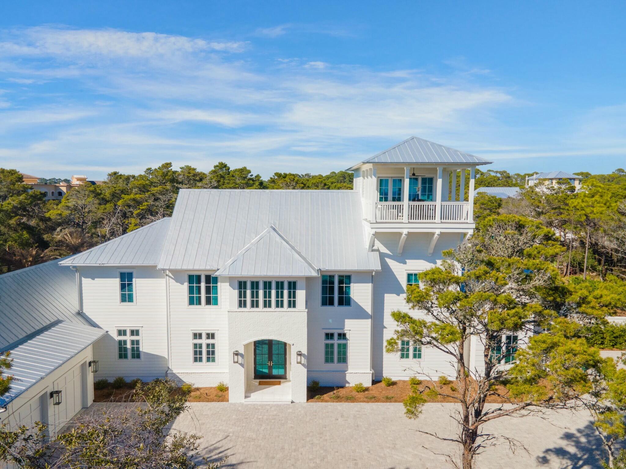Presenting 40 Whispering Wind Way - a newly constructed, custom-designed retreat that epitomizes the highest standard of privacy, seclusion, and luxury. Nestled within the exclusive gated enclave of Bannerman Beach, this extraordinary estate offers unmatched access to a pristine stretch of North Florida coastline. With 3.4 acres of private deeded beach access and only 19 boutique lots in this serene community, this property ensures an unparalleled level of exclusivity. Adjacent to the peaceful Grayton Beach State Park, the location along the coveted 30A corridor offers both natural beauty and a quiet, tranquil atmosphere.

The property boasts exceptional features such as a private pickleball court, a heated pool with a spacious pool deck, and sweeping Gulf views from the third-floor