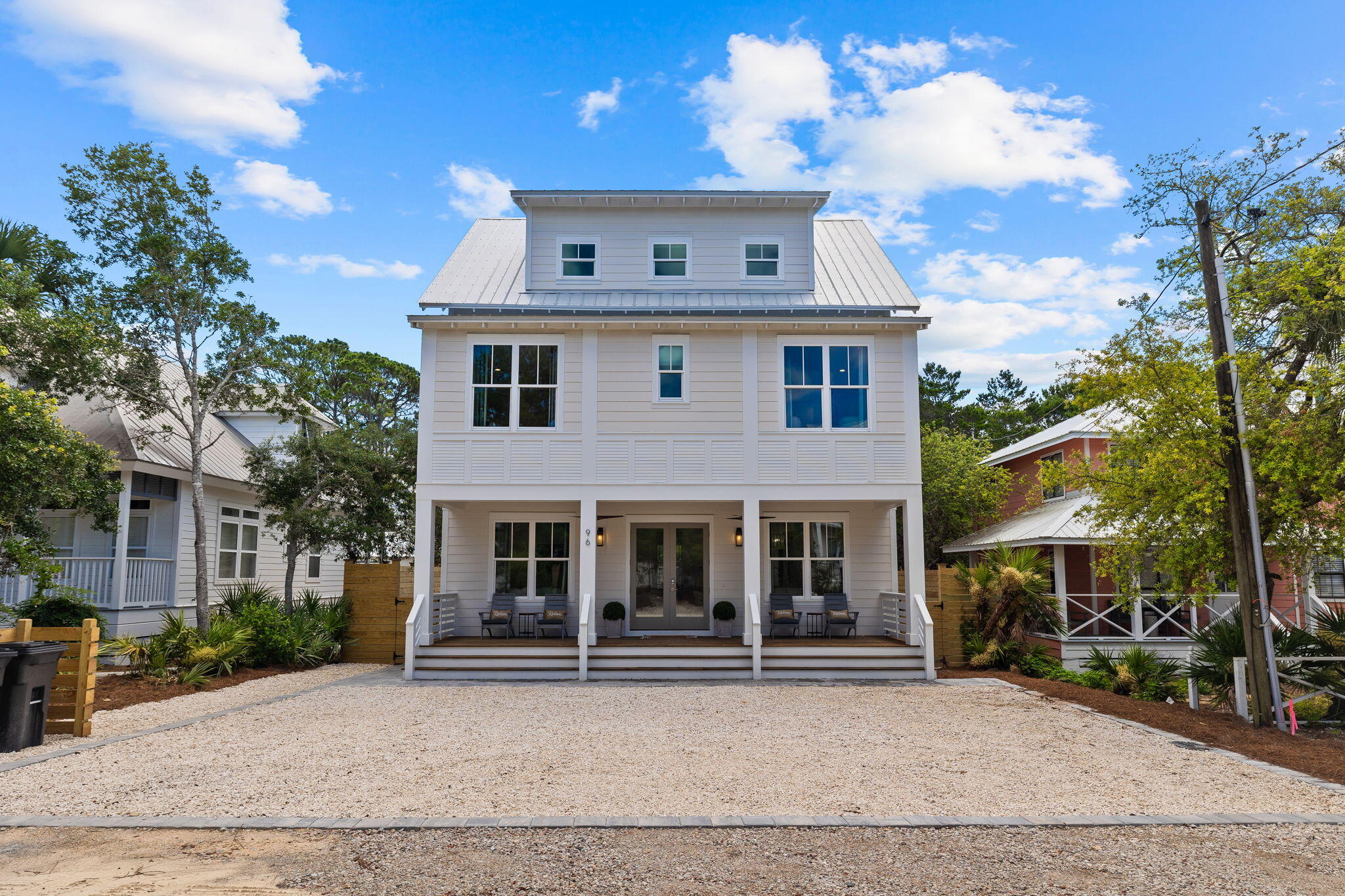 Welcome to Coastal Living, a luxurious retreat nestled in the heart of Seagrove on the highly sought-after south side of 30A. This stunning home offers an unparalleled beachside lifestyle, just a short walk or bike ride away from the emerald-green waters and sugar-white sands that define the area. Located on a serene street, this exquisite residence boasts a private outdoor oasis, perfect for both relaxation and entertainment. The beautifully landscaped backyard features lush turf surrounding a heated pool and spa, accented by a charming pergola—ideal for al fresco dining or simply soaking up the sun.

As you step inside, you'll be greeted by an atmosphere of elegance and comfort. The first floor invites you into a bright, open kitchen equipped with stainless steel appliances, sleek white cabinetry, and quartz countertops. The kitchen flows seamlessly into the main living area, creating a perfect space for entertaining. This level also includes a powder room and one of the home's four master bedrooms, complete with an ensuite bath and easy access to the pool area.

On the second floor, you'll find three more spacious master bedrooms, each with its own ensuite bath, ensuring privacy and comfort for all guests. One bedroom is thoughtfully designed with built-in bunks, making it an ideal spot for younger guests. A convenient centralized laundry room is also located on this level.

The third floor offers a vast entertainment space, featuring an office area, two sitting areas, and a full bathroom. Additionally, this level includes a bedroom with four queen-size built-in bunks, providing flexibility for accommodating larger groups or extended family.

Poised less than 0.3 miles away, the nearby Eastern Lake Neighborhood Beach Access overlooks the rare Coastal Dune Lake while providing beachgoers with amenities like a wash-off station, bike rack, and parking accommodations including the new Eastern Lake parking project that will offer additional bike, golf cart, and vehicle spots.

Fully furnished and ready for rental, this home is waiting for you. Schedule your private viewing today and experience the pinnacle of coastal living.