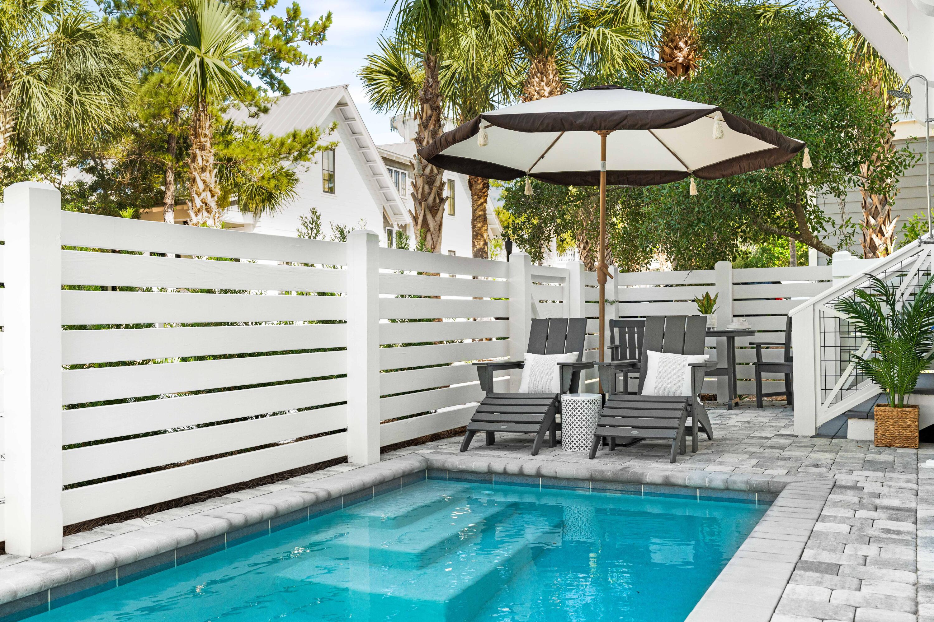 STUNNING!  Just completed and easy show, NEW CONSTRUCTION home in Seacrest Beach with PRIVATE POOL!   Custom-built 5 bedrooms, 6 bathrooms, with additional Flex Room and Media Room.   Fully furnished and decorated, this spectacular 30A turnkey beach house is ready now for your family to enjoy!   Never rented but rental-ready with all included linens, dishware, kitchenware, bedding and necessary vacation home supplies. Everything you need to hit the ground running!

A bright and airy CHEF'S KITCHEN features a sizeable, quartz waterfall island, floating shelves, and Pro Grade appliances from SUBZERO and THERMADOR, including SUBZERO'S 48'' Pro Grade flagship refrigerator.  Create memorable family dinners with the THERMADOR 48' Gas Range Cooktop with double oven! This kitchen is an entertainer's dream, with a separate Undercounter Ice Maker, Wine/Beverage Fridge, Drawer Microwave, cast iron Kohler farmhouse sink and additional prep sink.

Step out back to the private, 3,000-gallon, saltwater, GAS-HEATED dipping POOL, perfect for relaxing after a full day at the beach, and popular with rental vacationers!  

The third floor is the entertainment center of the home, with a Media Room, Wet bar, Separate Ice Maker, Wine/Beveridge Fridge, spacious outdoor Covered Porch with seating and dining areas, and BUNK ROOM that sleeps 6!

Designed to be used as a vacation rental or second home, this new construction residence features real hardwood floors (not vinyl), generous closets, custom tile work, shiplap walls, a custom-built swing daybed on the primary bedroom covered porch, designer lighting and finishes throughout, as well as another inviting porch swing on the ground floor.    

If utilized as a vacation rental  property, 205 Seacrest Beach Blvd sleeps up to 16 guests, with its 5 bedrooms (each with a full bathroom), including a 3rd floor bunkroom which sleeps 6, and a 3rd floor media room for the kids.   Additionally, the primary bedroom features a FLEX ROOM that can be used as an office, a nursery, or owner's lockout closet.  On the second floor you will also find a FULL-SIZE laundry room, with deep sink, LG washer-dryer appliances and custom cabinetry for ample storage.   Enjoy virtually instant hot water throughout the home with 2 large, tankless, gas water heaters.  You and your guests will enjoy the 3-space driveway in the rear of the property, plus an additional parking space up front!  SMART HOME features include 2 NEST camera doorbells on the front and back doors, 3 NEST Wifi-connected Thermostats, as well as WIFI connected Thermador Oven, Subzero Fridge and LG Washer Dryer.

More than 700 square feet of covered outdoor living porches invite the coastal breeze into this home and beckon you to relax outside.   Spend time with family and friends on the WEST-FACING top floor covered porch and enjoy the breathtaking 30a sunsets. 

Located between Rosemary Beach and Alys Beach, and just a few minutes' walk to fantastic restaurants, bars and boutique shopping, this new home is a perfect luxury second home or vacation rental property.  Built by award-winning CHIMAR CONSTRUCTION, this home's builder warranty conveys with sale.   

Seacrest Beach is a deeded, private-beach community on the thriving east end of 30A.   A tram service is provided throughout the Seacrest Beach neighborhood so you can quickly and easily arrive at the white pristine private beaches and beautiful waters of the Gulf of Mexico. And just a short stroll to the largest pool on the east end of 30A, Seacrest Beach's 12,000-sq.-ft., community pool. Seacrest Beach is a vacation favorite with palm-lined streets and nature trails near the world-class dining and shopping that Scenic Highway 30A is known for!