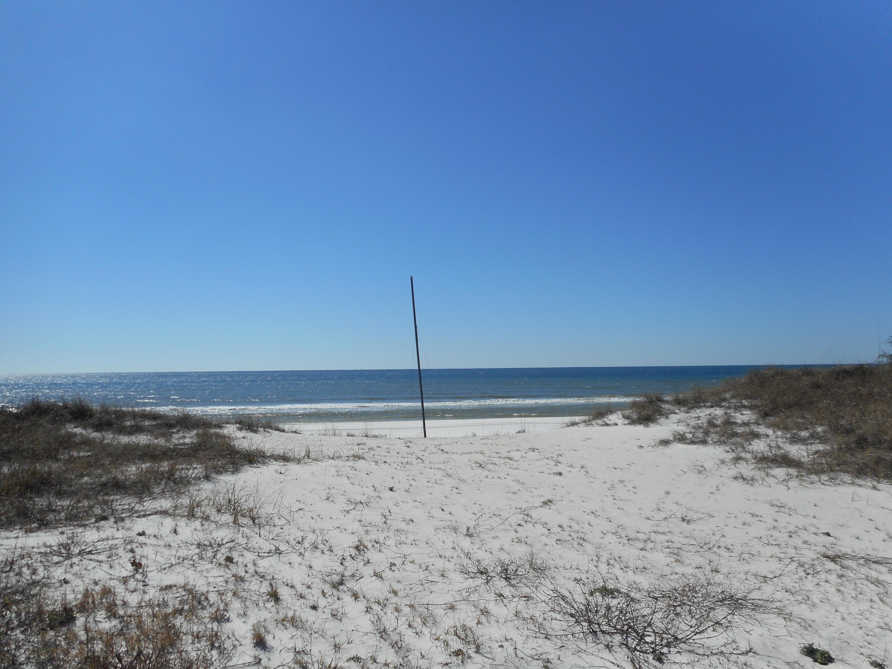 One of the last 100 foot Beach Lots on the entire Emerald Coast that allows you to build a 6000 to 7000 square foot estate home with possible infinity pool on the gulf side. Typical plans available. Located just east of Topsail State park in a secluded beach area however is near shopping, restaurants and medical facilities.
Lot dimensions are to be verified by survey which is available.
Beach Highland Subd. Association Membership is voluntary.
Property open for viewing however chain across entry is locked.